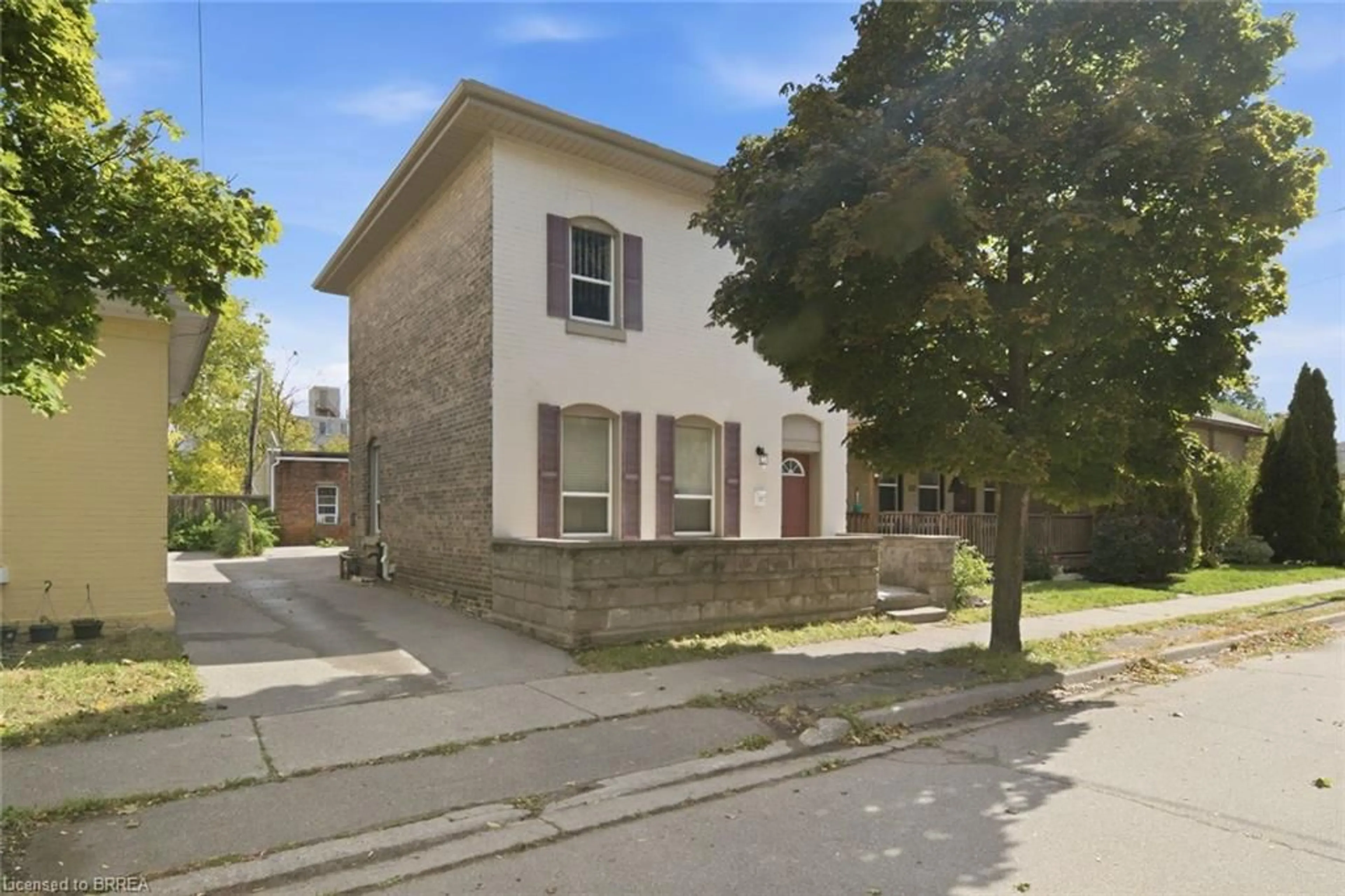Home with brick exterior material, street for 97 Queen St, Brantford Ontario N3T 3C1