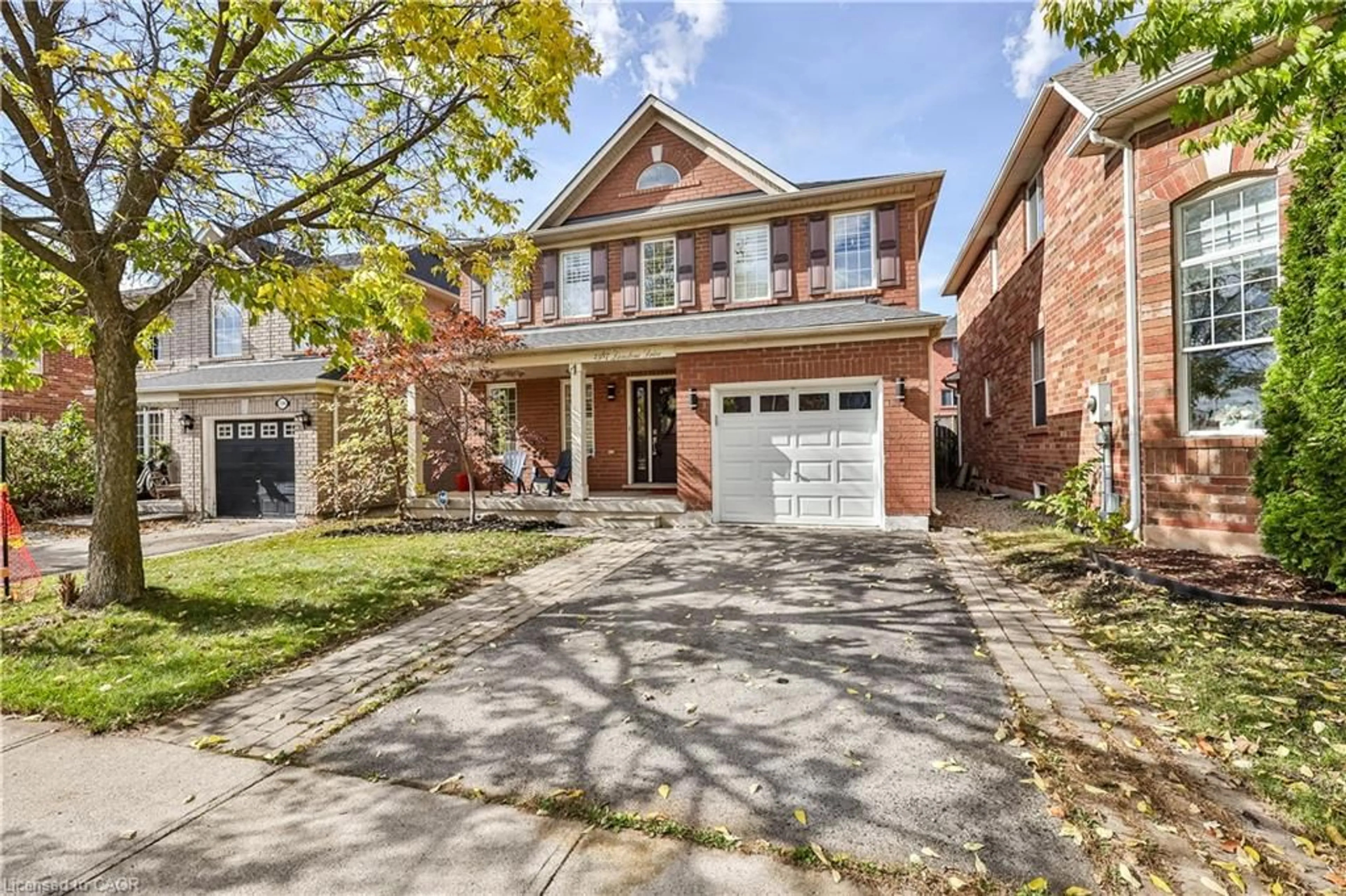 Home with brick exterior material, street for 2387 Lionstone Dr, Oakville Ontario L6M 4S8