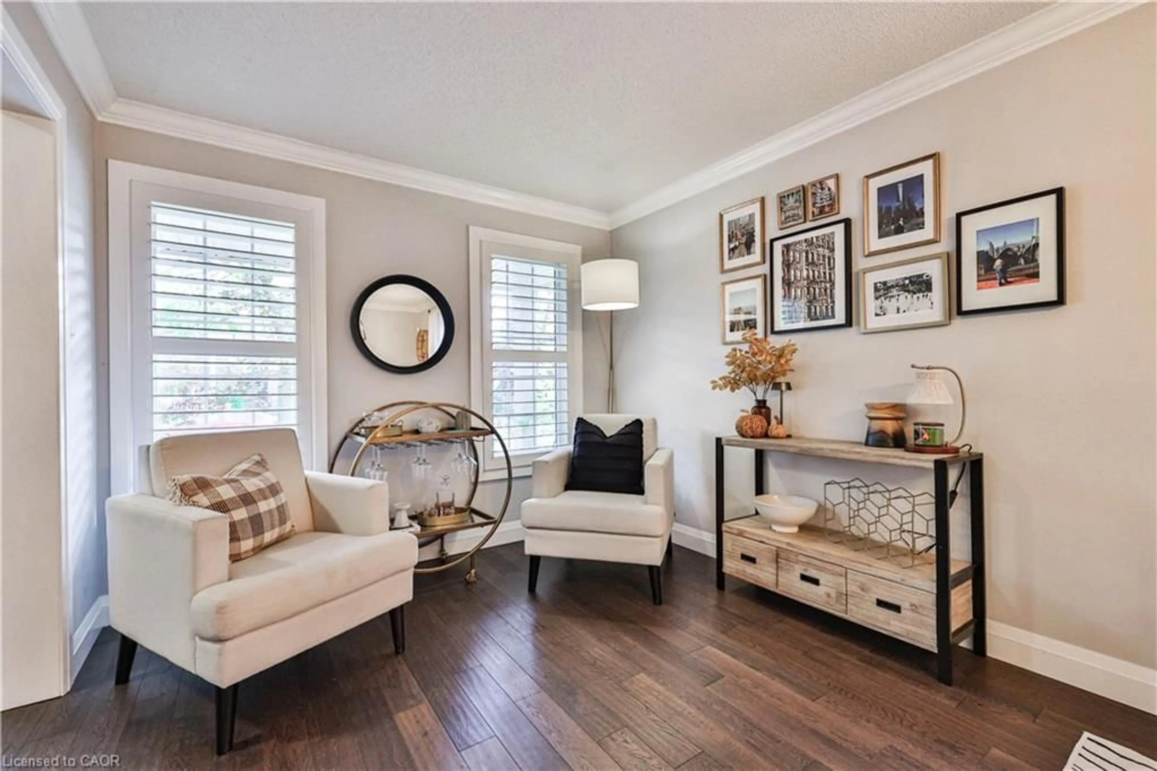 Living room with furniture, wood/laminate floor for 2387 Lionstone Dr, Oakville Ontario L6M 4S8