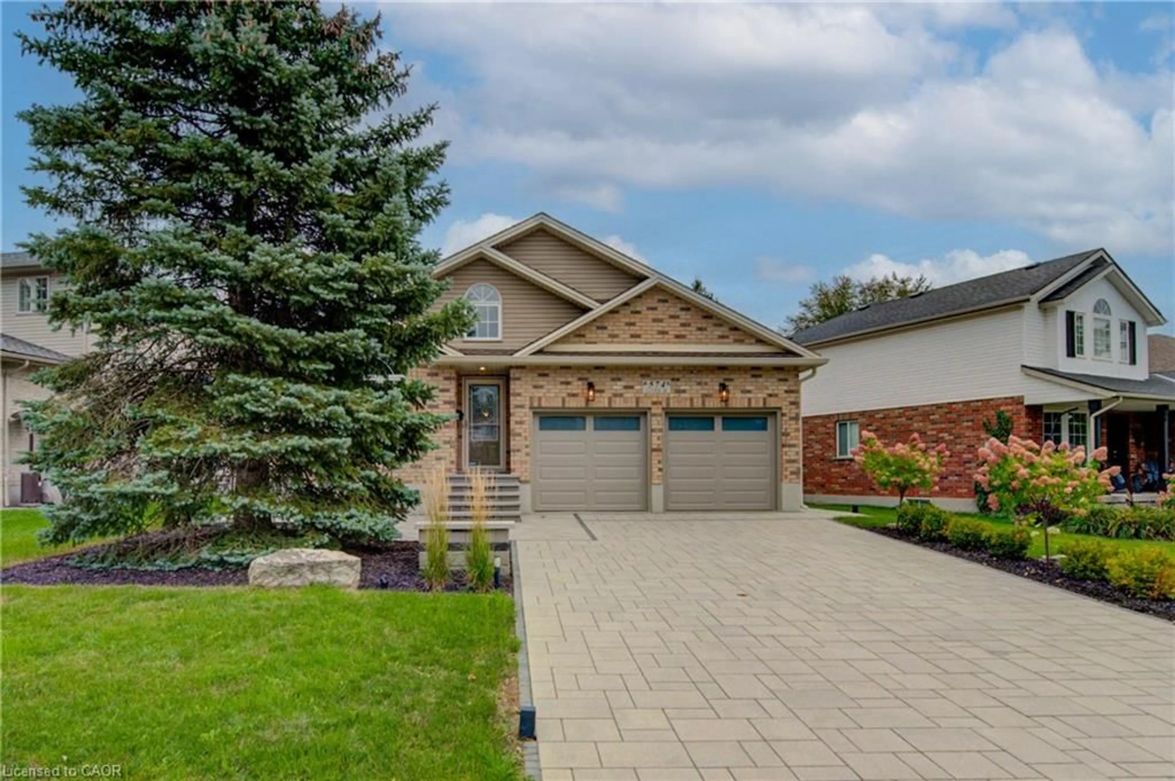 Home with brick exterior material, street for 574 Clipper Dr, Waterloo Ontario N2K 4B4