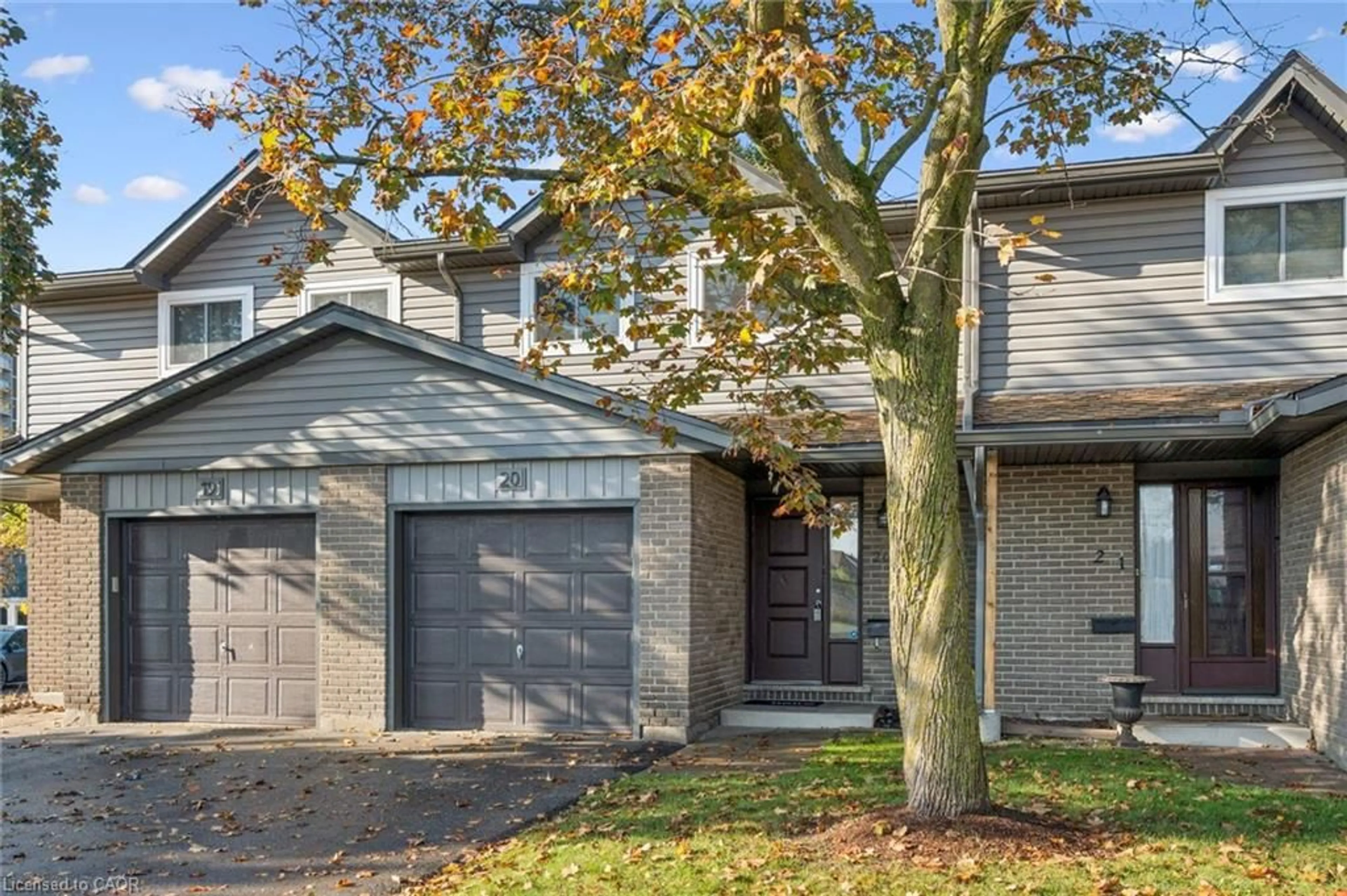 Home with brick exterior material, street for 46 Cedarwoods Cres #20, Kitchener Ontario N2C 2L7