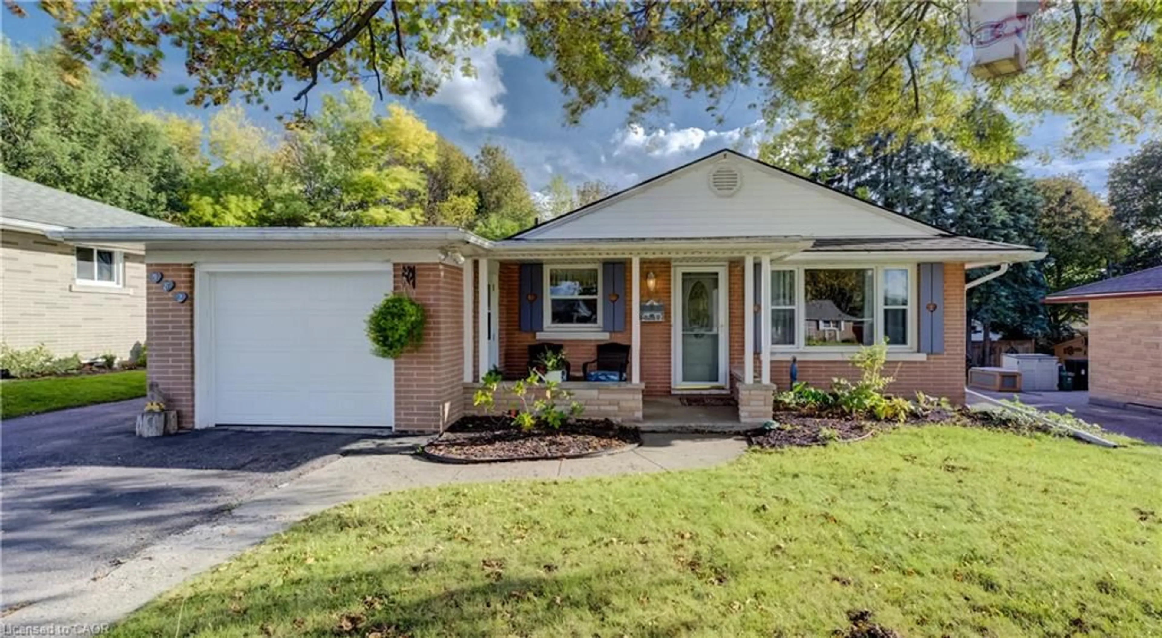 Home with brick exterior material, street for 582 Grand Valley Dr, Cambridge Ontario N3H 2S1