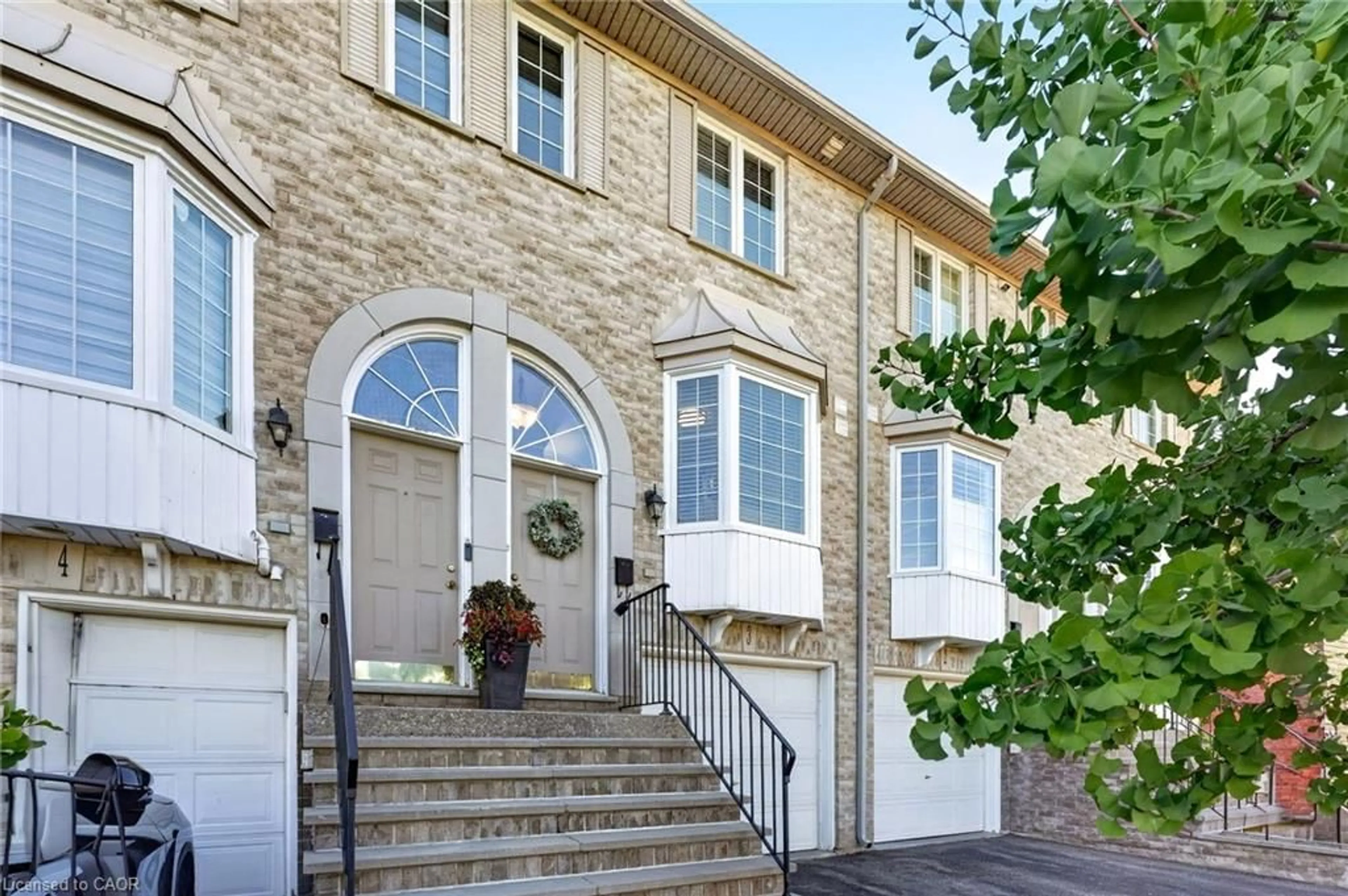Home with brick exterior material, street for 3480 Upper Middle Rd #3, Burlington Ontario L7M 4R8