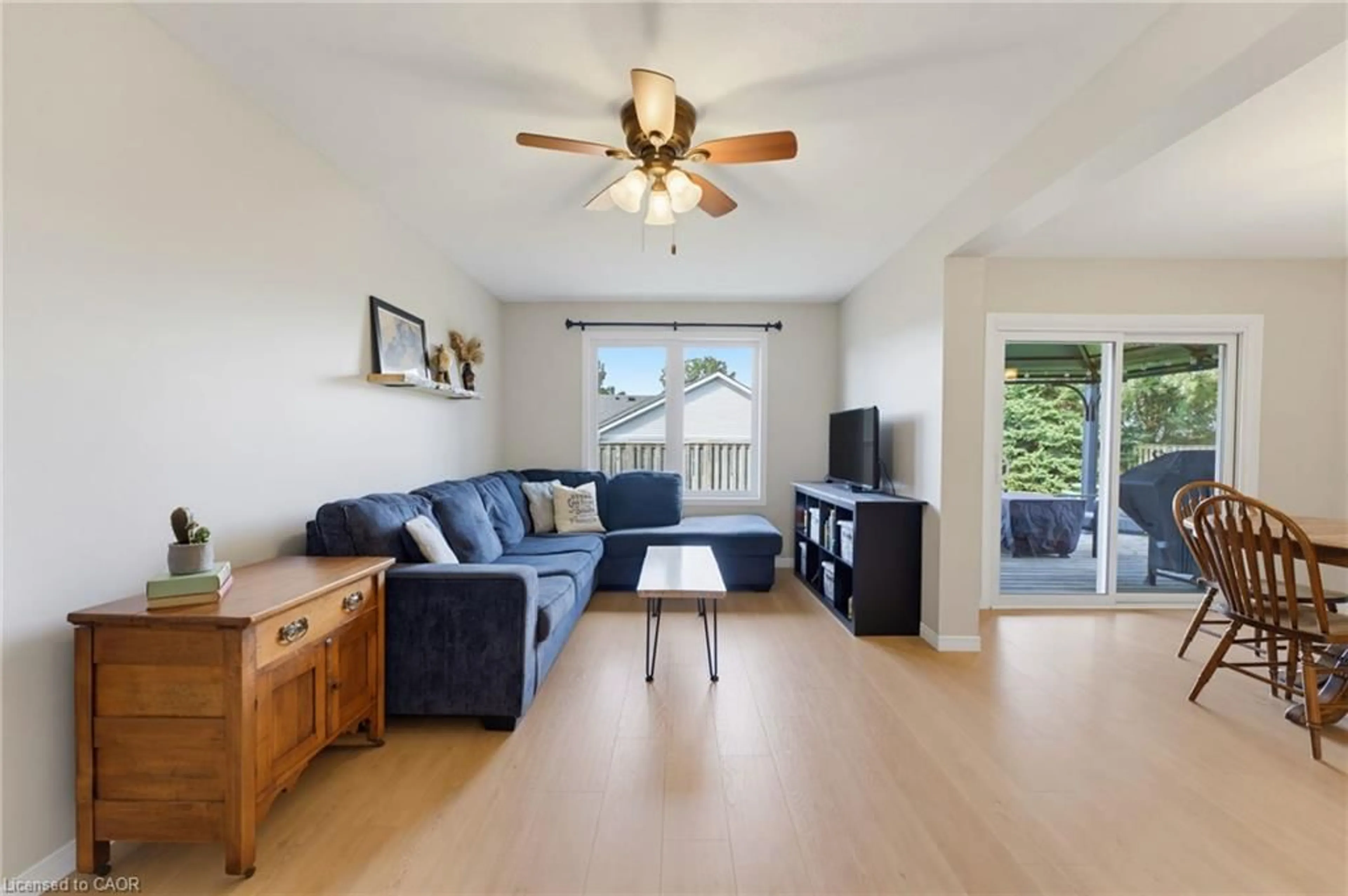 Living room with furniture, wood/laminate floor for 15 Barnett St, Listowel Ontario N4W 3V9