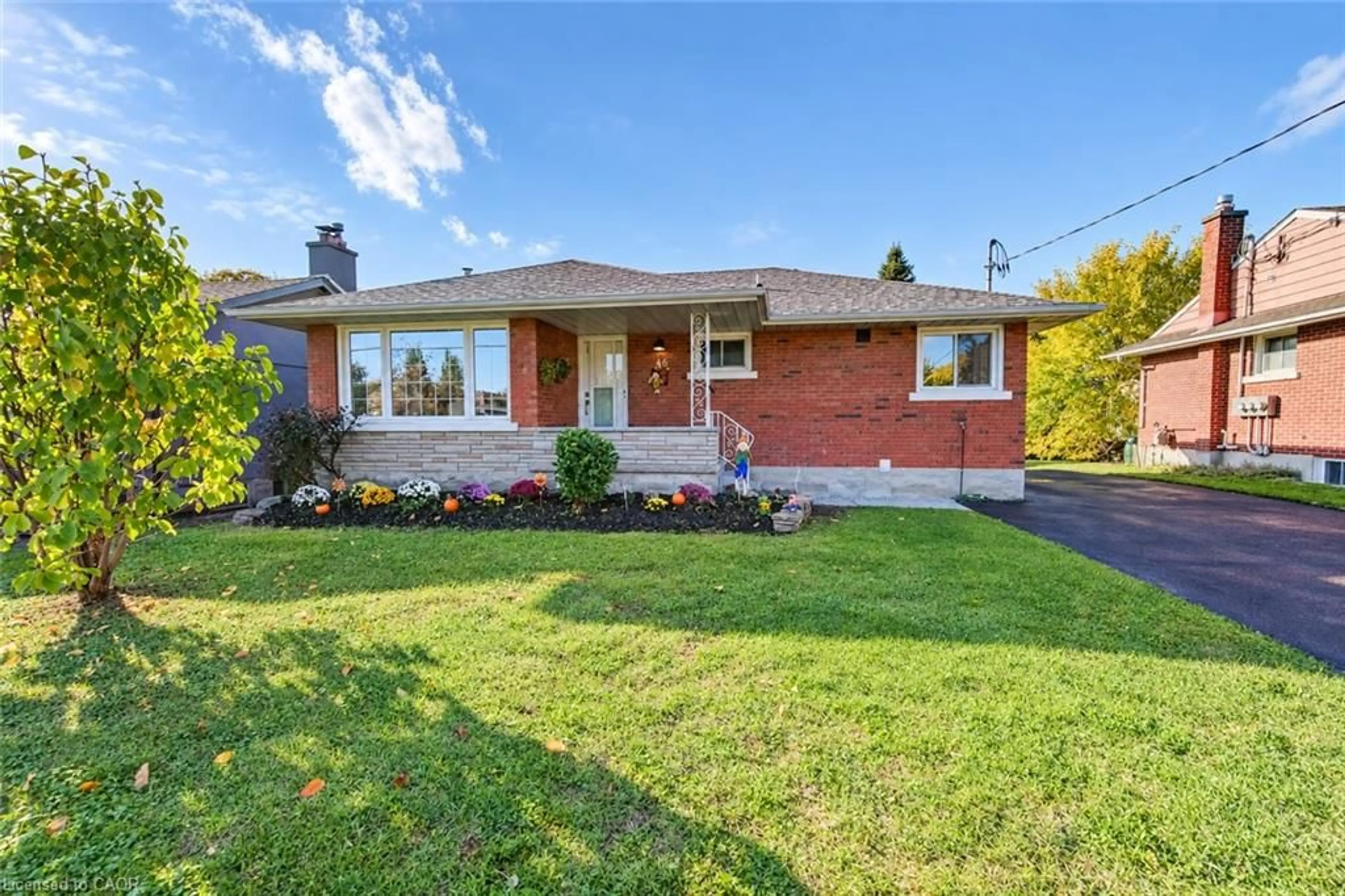 Home with brick exterior material, street for 46 Traynor Ave, Kitchener Ontario N2C 1V9