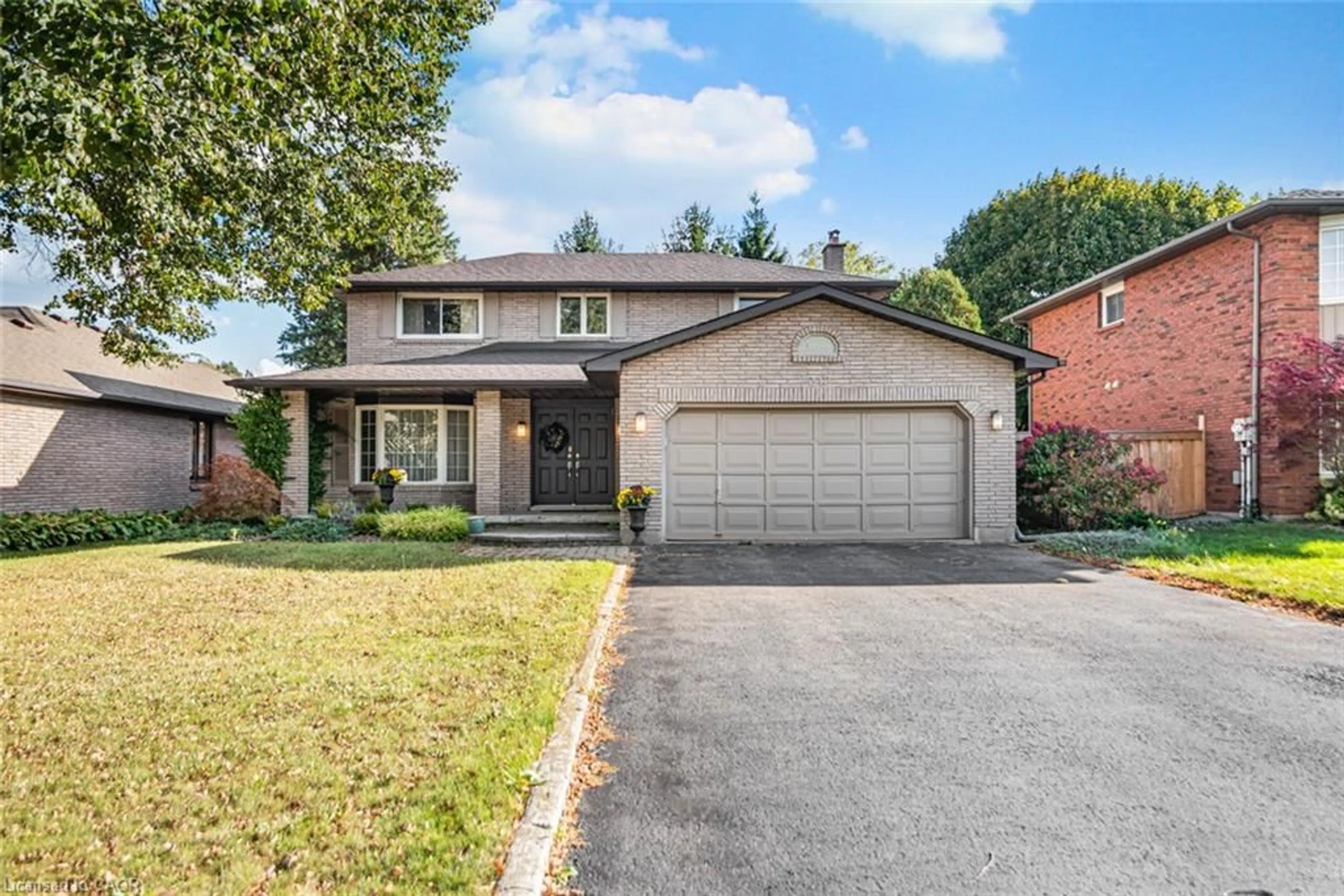 Home with brick exterior material, street for 318 Cavendish Dr, Ancaster Ontario L9G 4T5