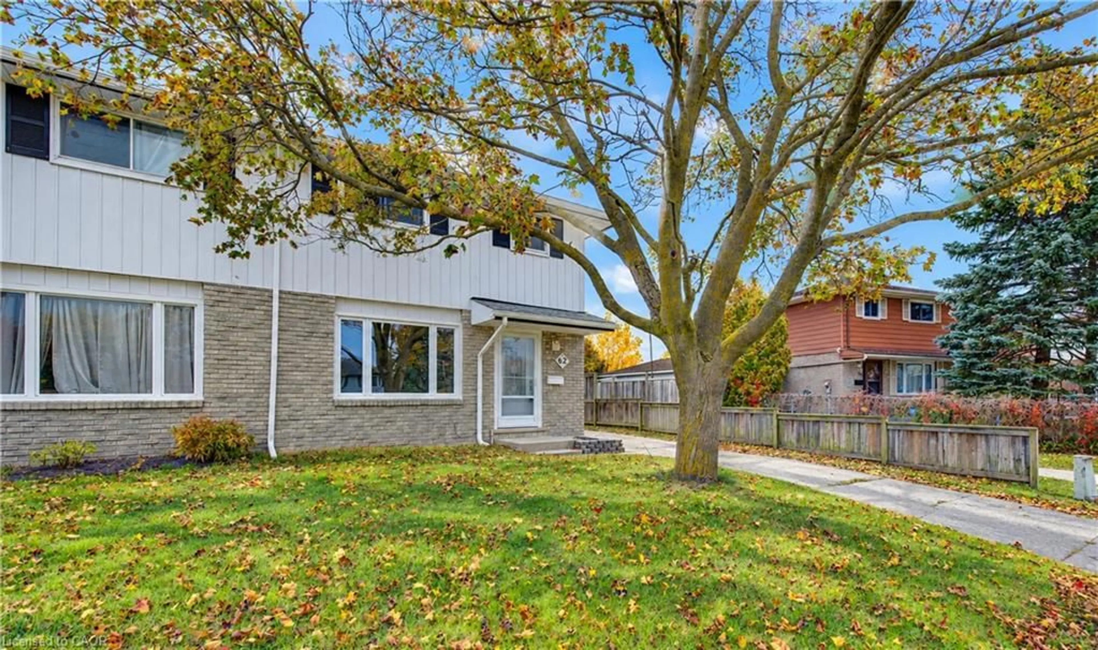 Home with brick exterior material, street for 62 The Country Way, Kitchener Ontario N2E 2K8