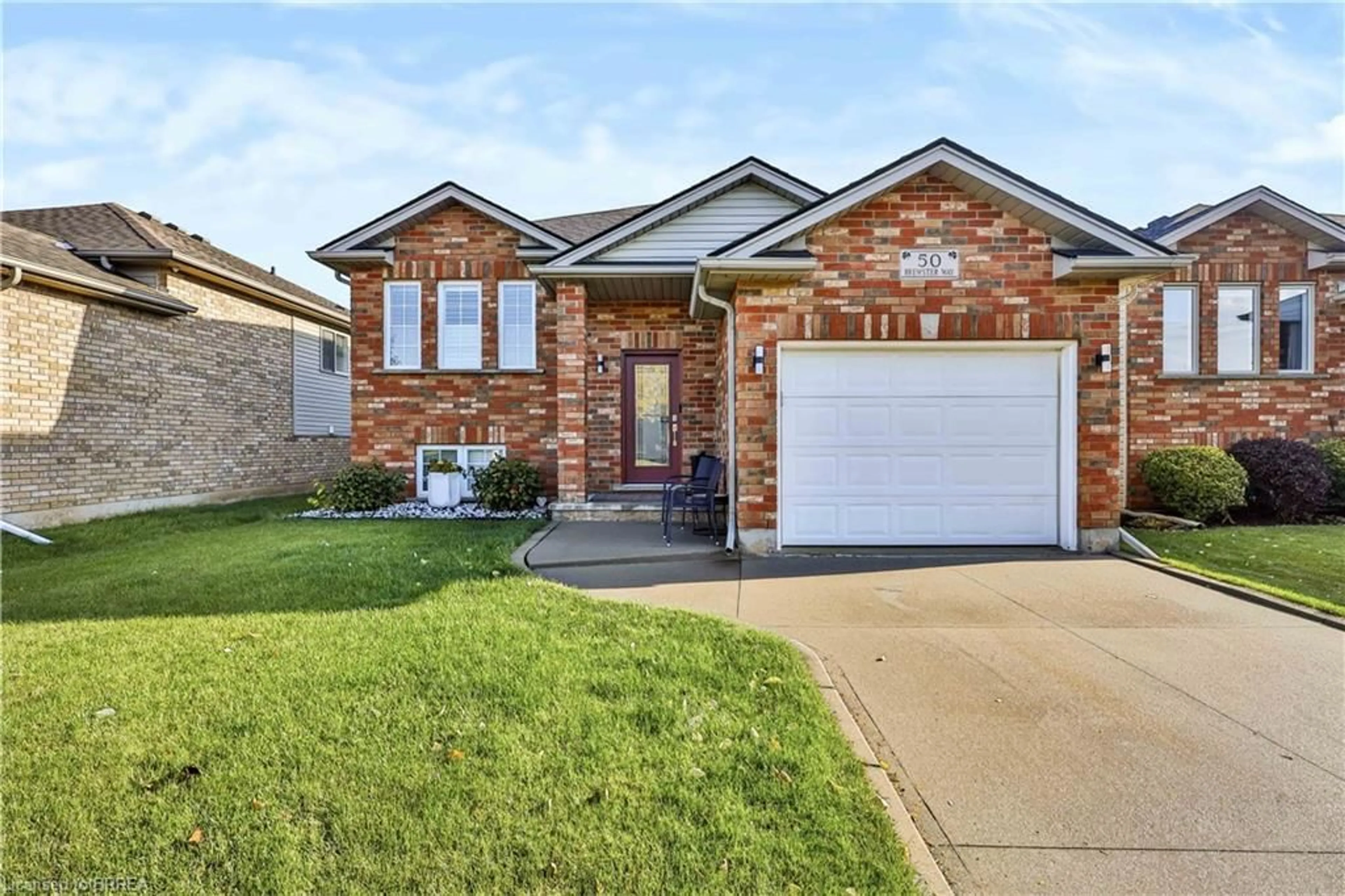 Home with brick exterior material, street for 50 Brewster Way, Brantford Ontario N3T 6N4