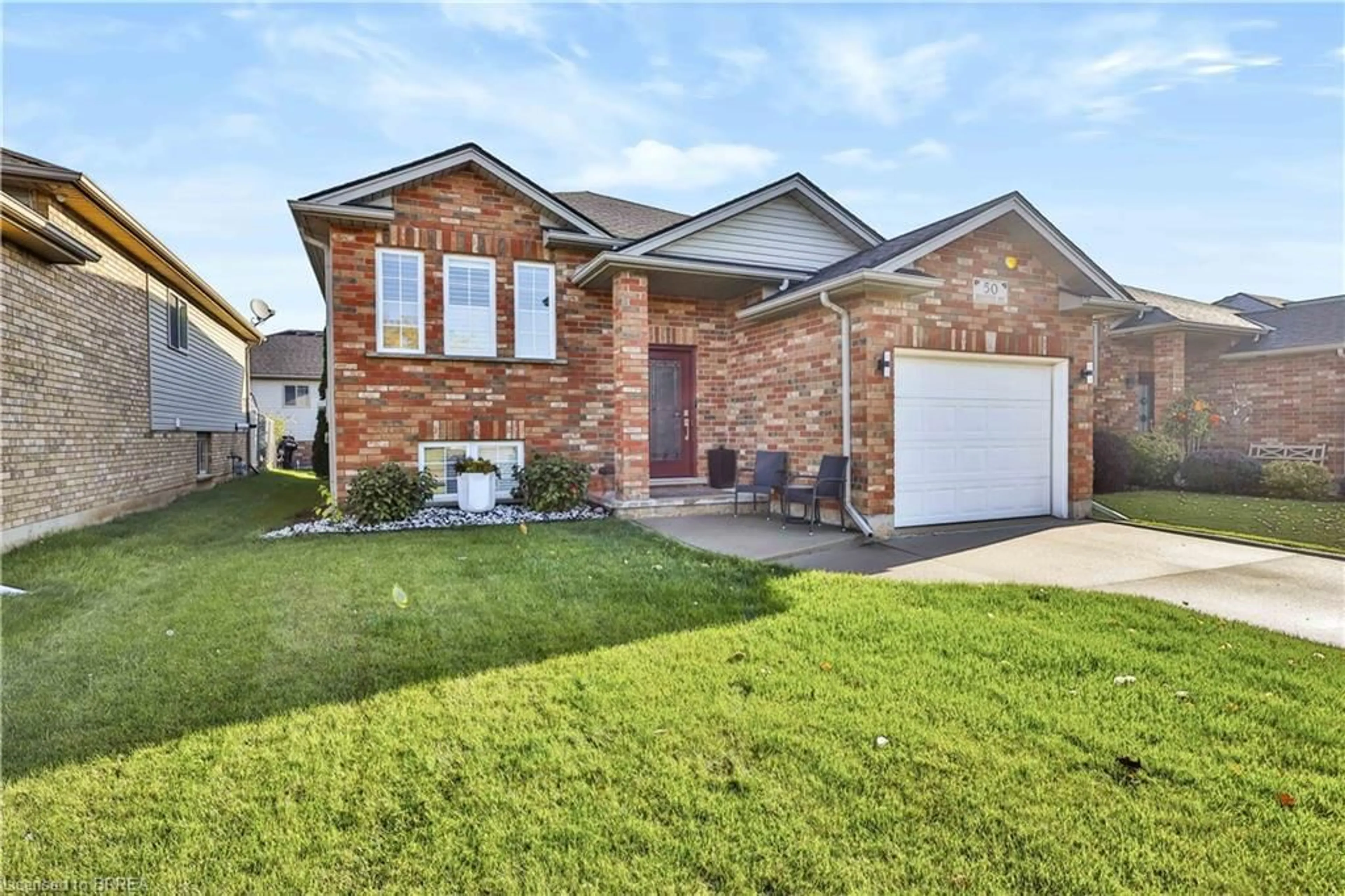 Home with brick exterior material, street for 50 Brewster Way, Brantford Ontario N3T 6N4
