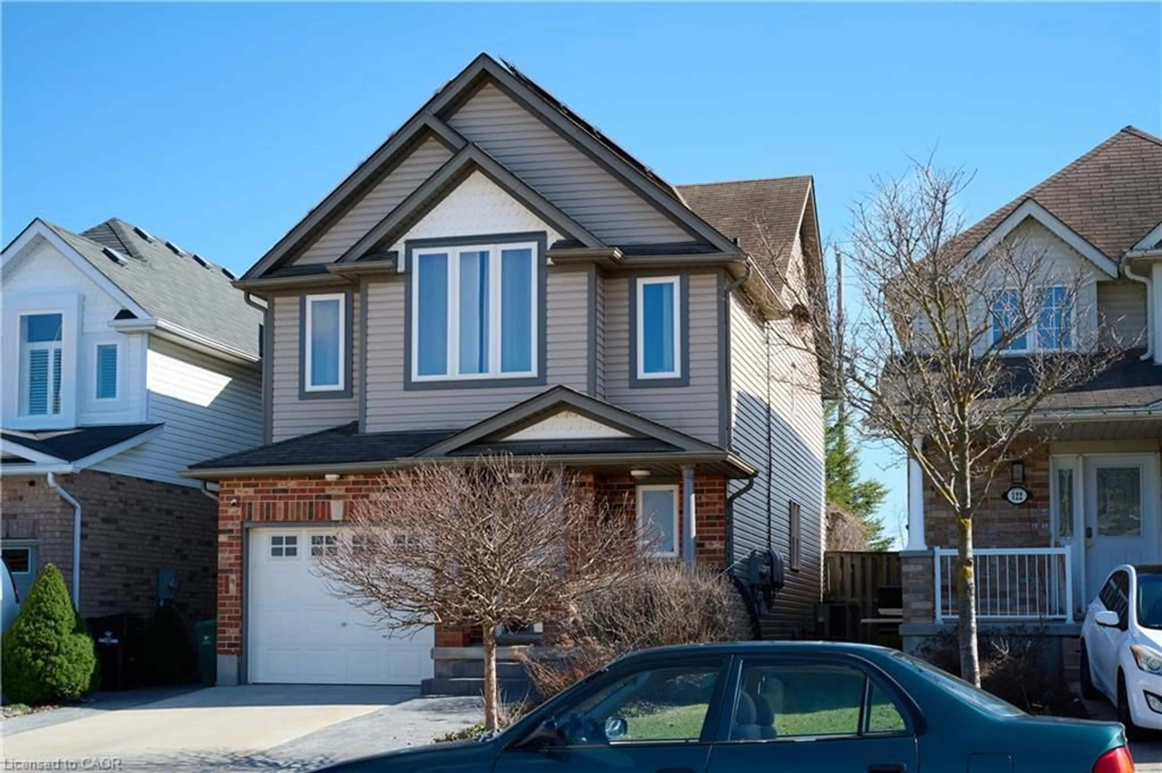 Home with vinyl exterior material, street for 126 Snowdrop Cres, Kitchener Ontario N2E 4G7