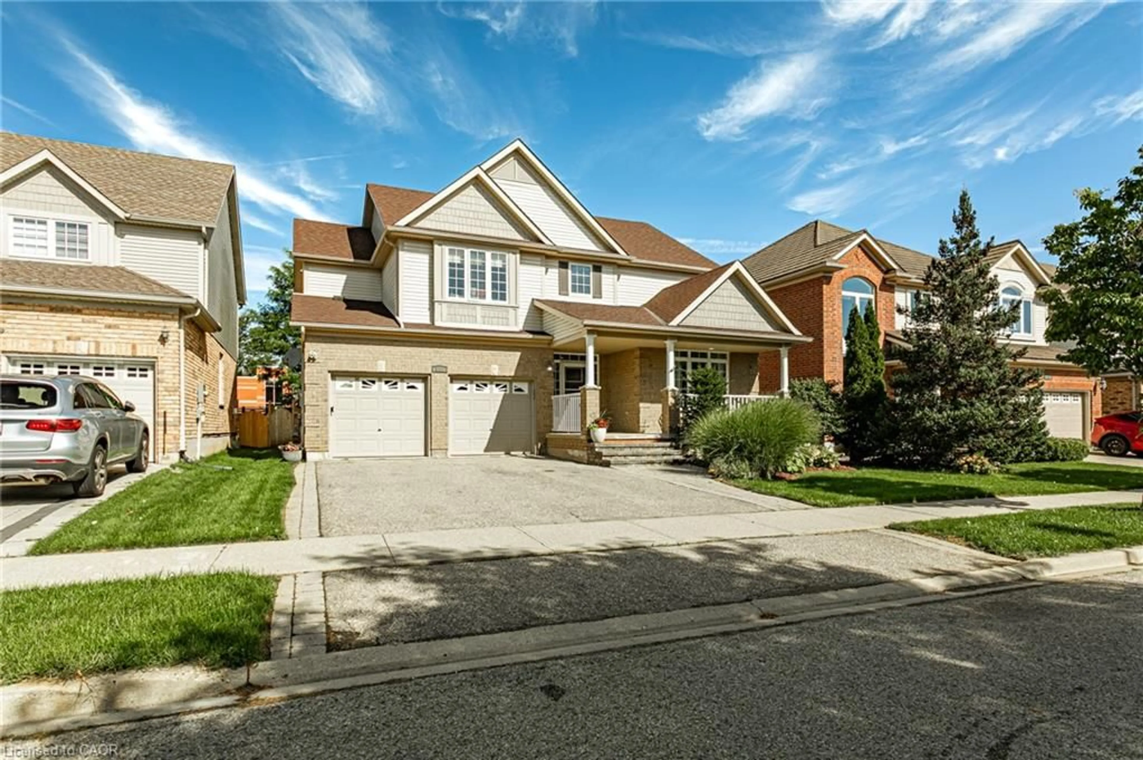 Home with brick exterior material, street for 312 Schooner Cres, Waterloo Ontario N2K 4M5