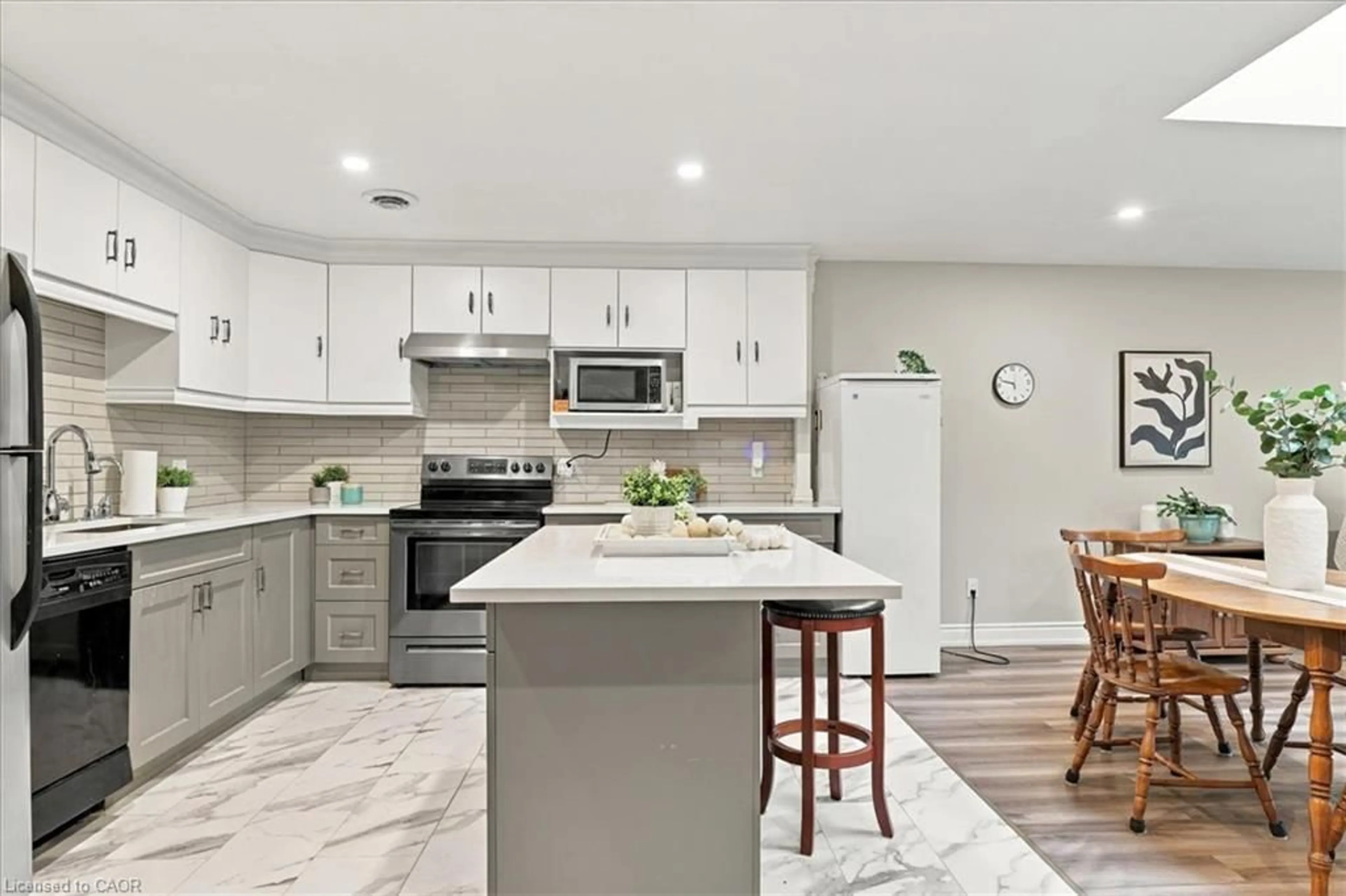Open concept kitchen, ceramic/tile floor for 200 River St #405, Fergus Ontario N1M 3H8