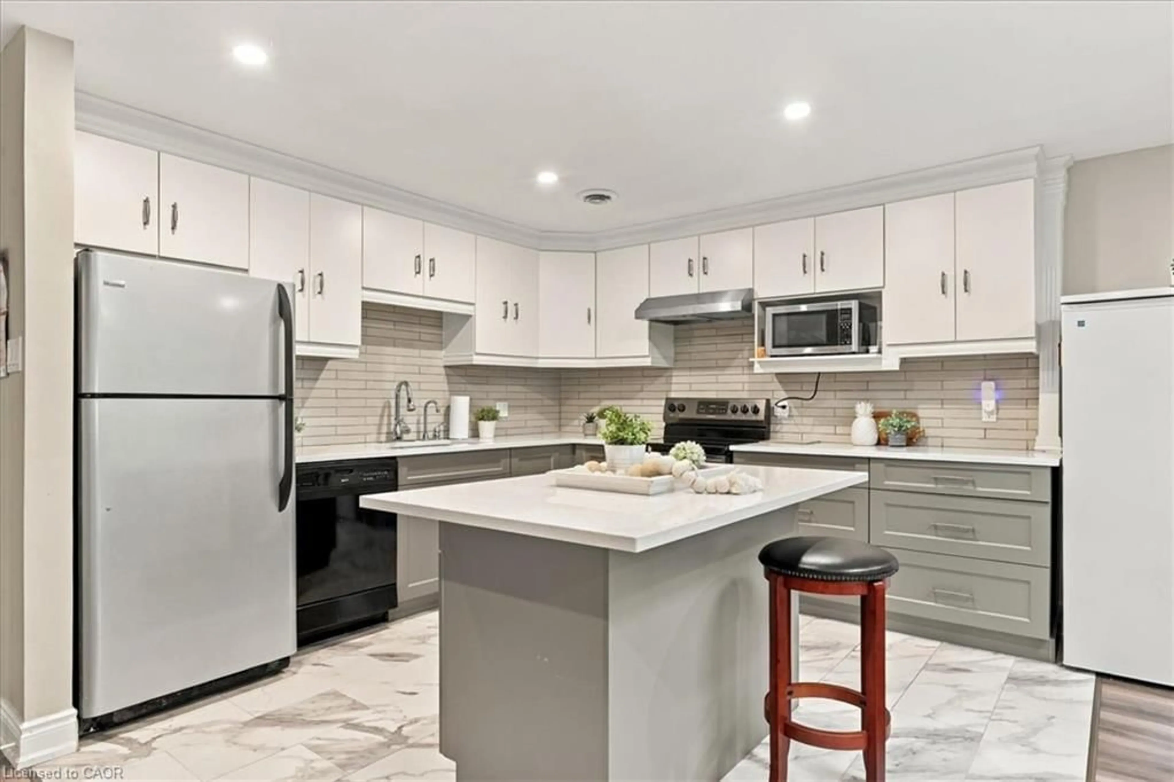 Open concept kitchen, ceramic/tile floor for 200 River St #405, Fergus Ontario N1M 3H8