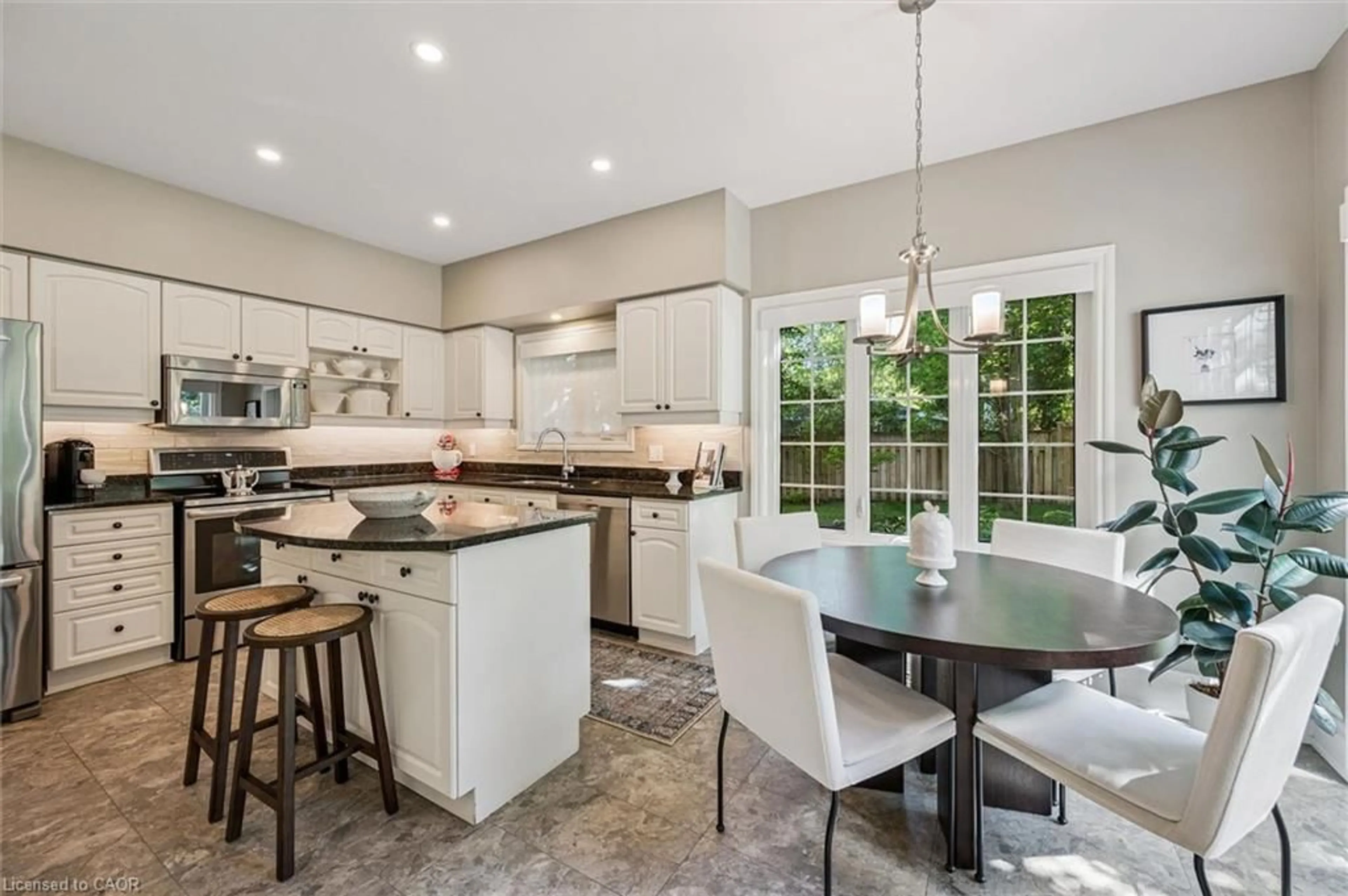 Open concept kitchen, ceramic/tile floor for 25 Manor Park Cres #11, Guelph Ontario N1G 1A2