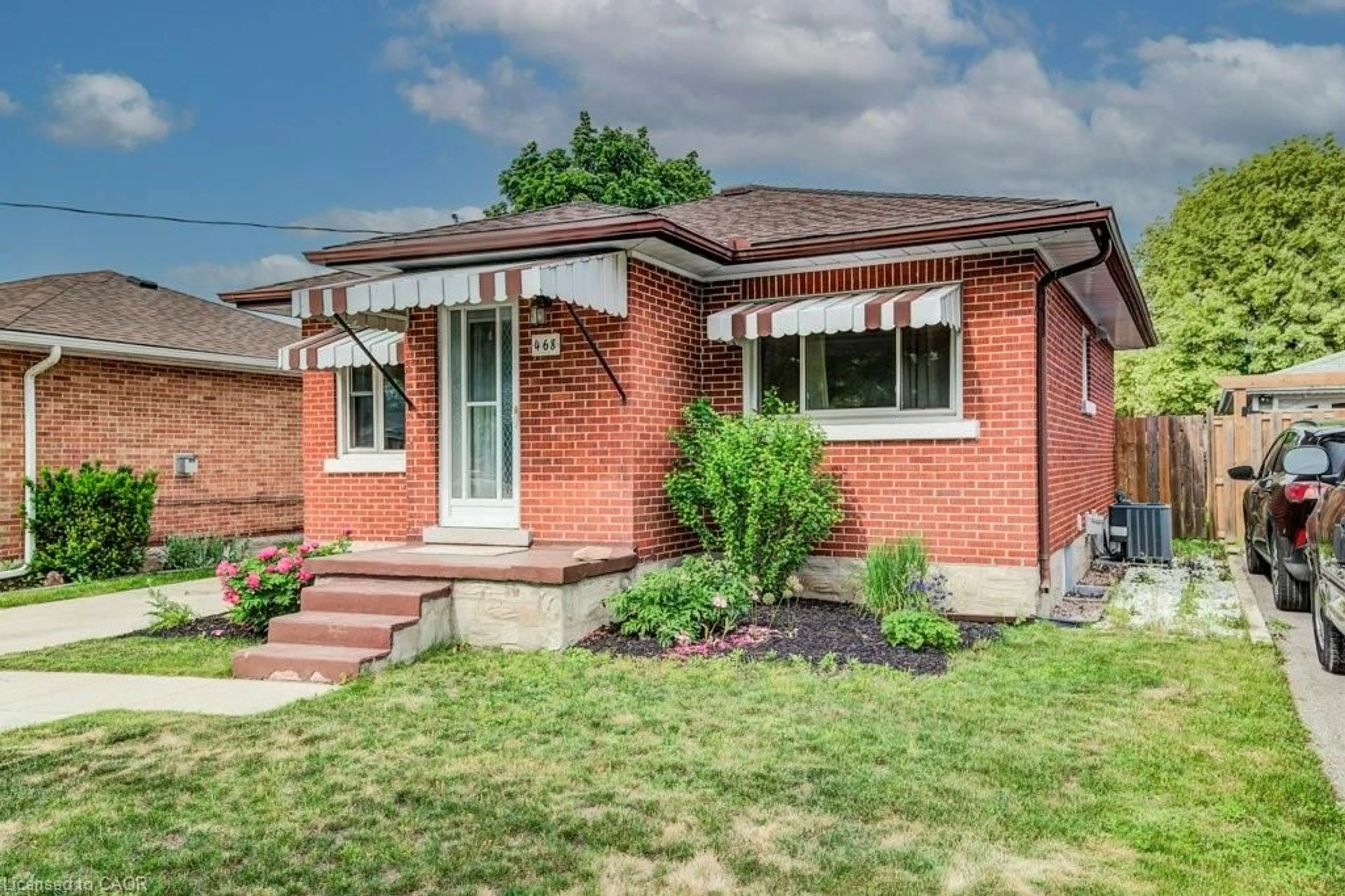 Home with brick exterior material, street for 468 Highland Rd, Kitchener Ontario N2M 3W7