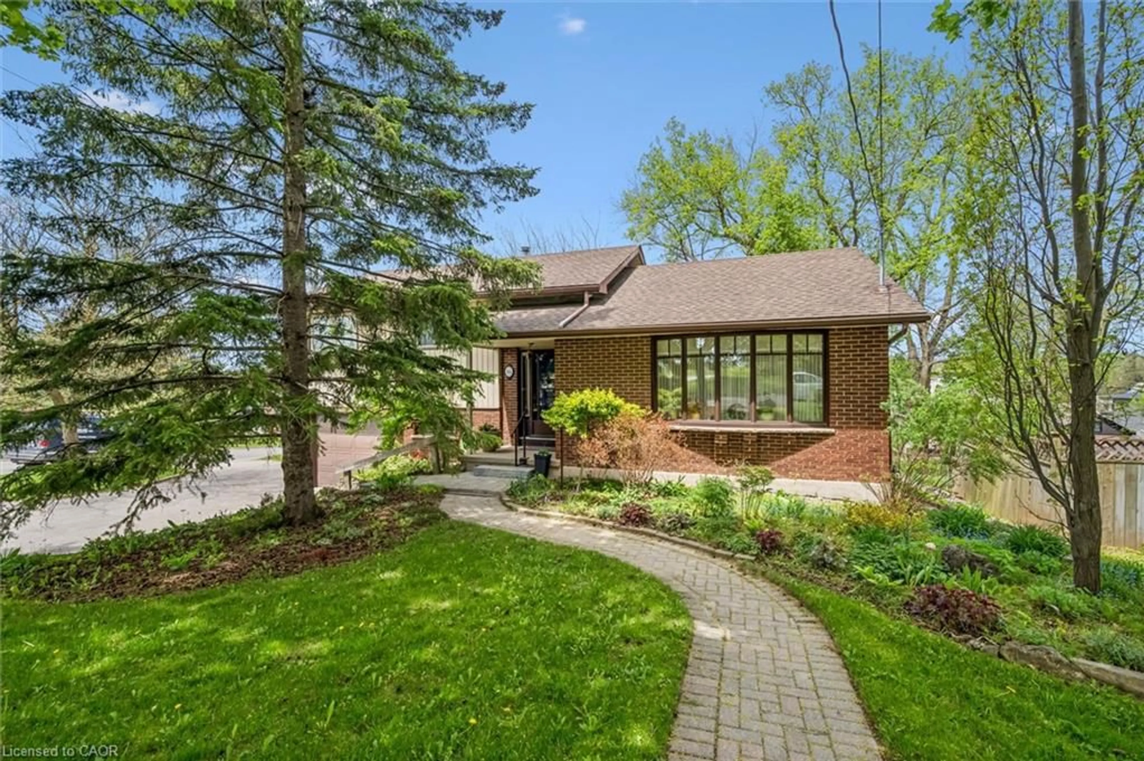 Home with brick exterior material, street for 16 Water St, Elora Ontario N0B 1S0