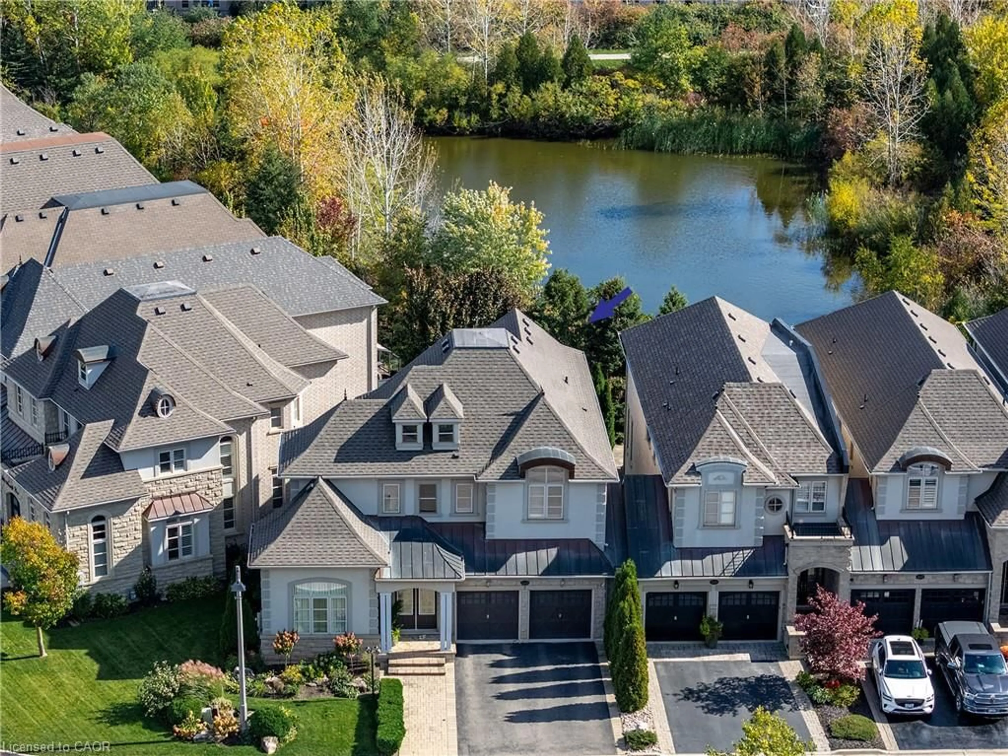 A pic from outside/outdoor area/front of a property/back of a property/a pic from drone, water/lake/river/ocean view for 3168 Watercliffe Crt, Oakville Ontario L6M 0K7