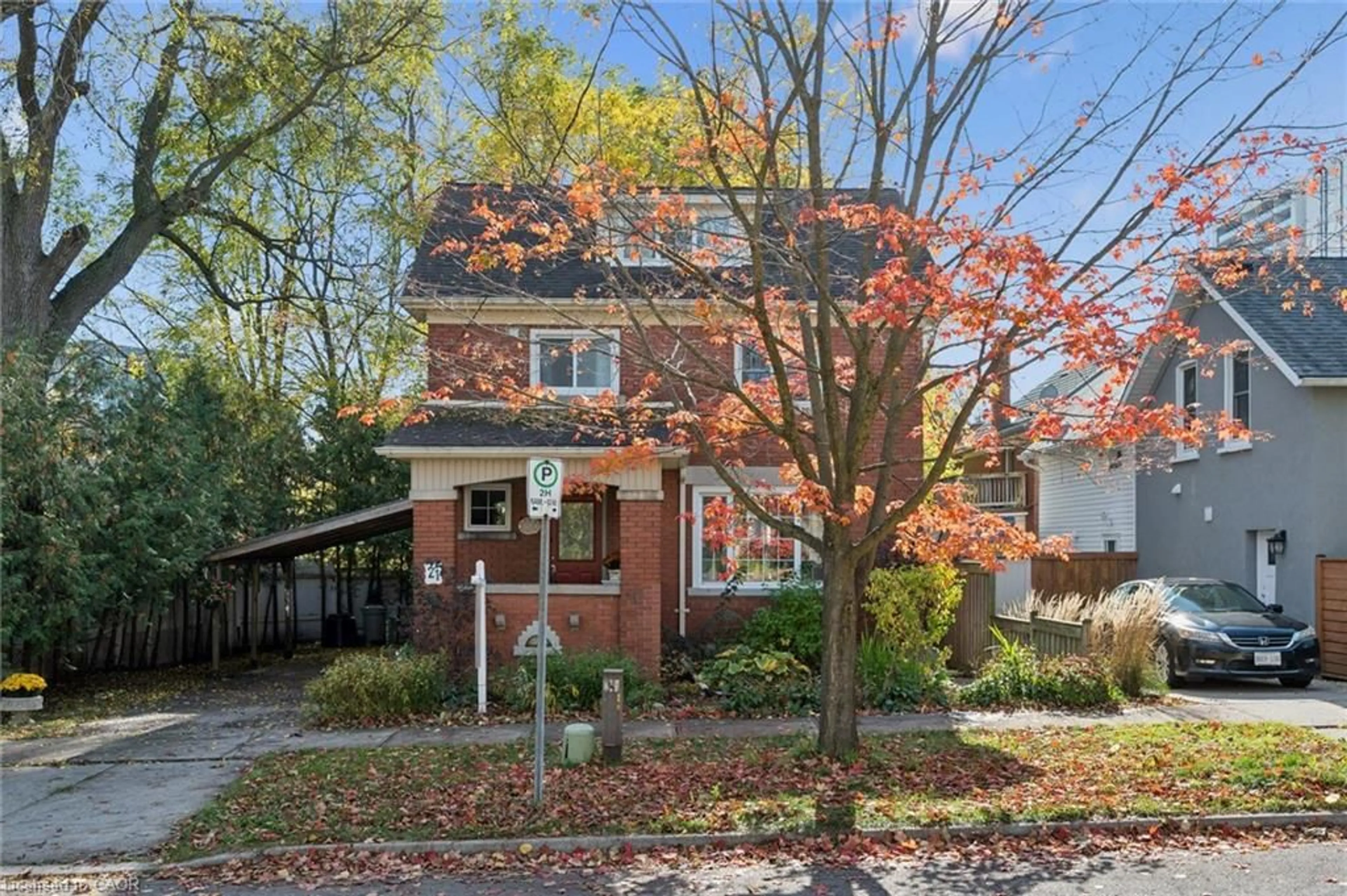 Home with brick exterior material, street for 21 Braun St, Kitchener Ontario N2H 3R2