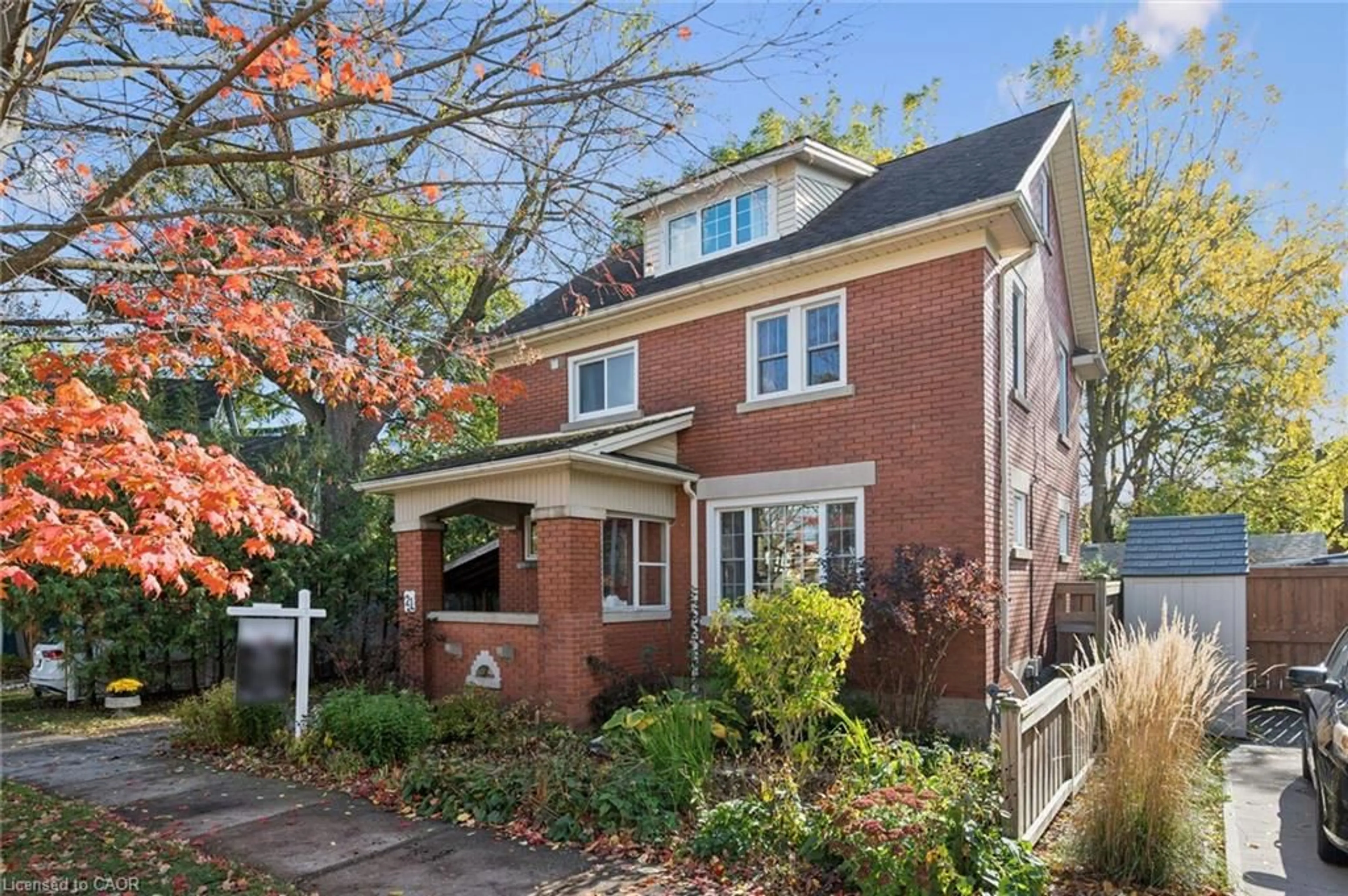 Home with brick exterior material, street for 21 Braun St, Kitchener Ontario N2H 3R2