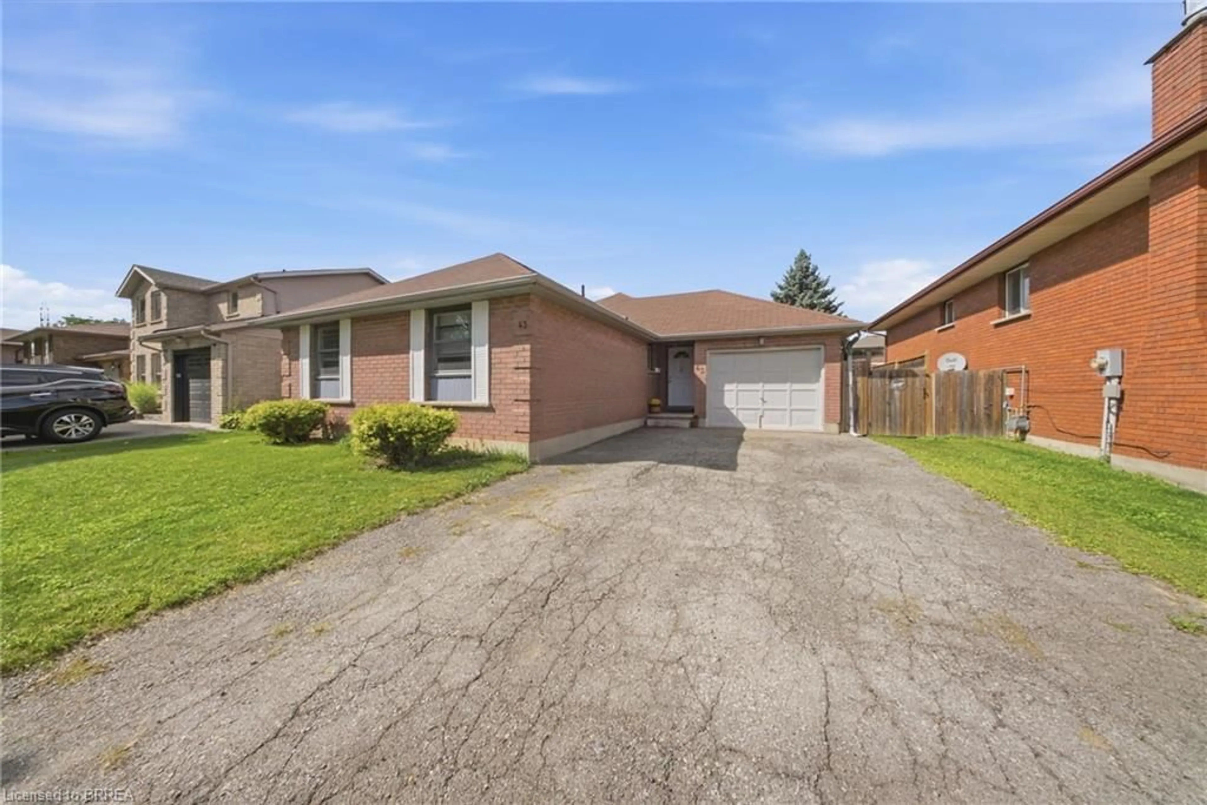 Home with brick exterior material, street for 43 Ruffian Rd, Brantford Ontario N3P 1R5