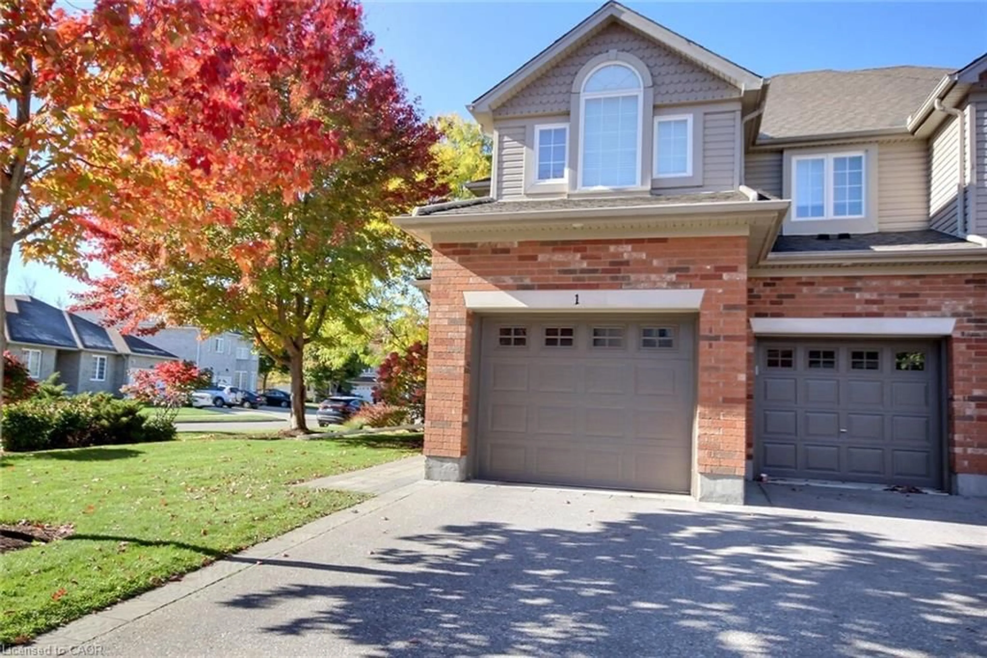 Home with brick exterior material, street for 755 Willow Rd #1, Guelph Ontario N1K 2A2