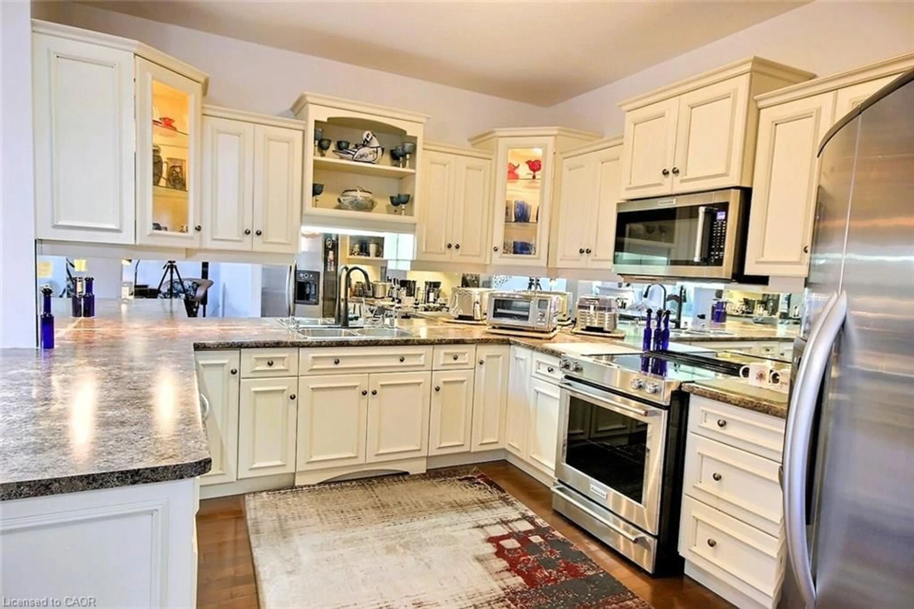 Open concept kitchen, ceramic/tile floor for 755 Willow Rd #1, Guelph Ontario N1K 2A2