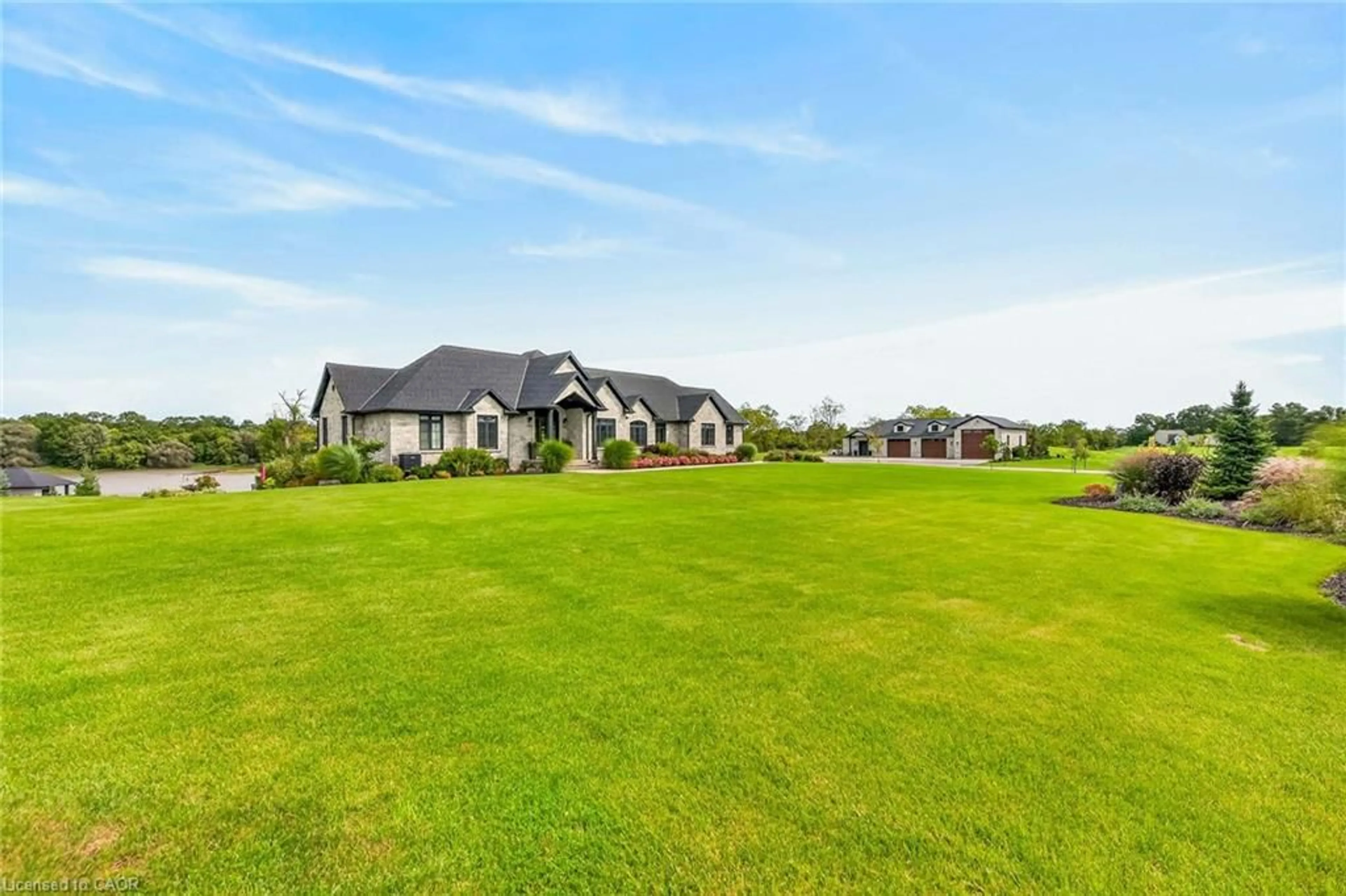 A pic from outside/outdoor area/front of a property/back of a property/a pic from drone, water/lake/river/ocean view for 2064 River Rd, Cayuga Ontario N0A 1E0