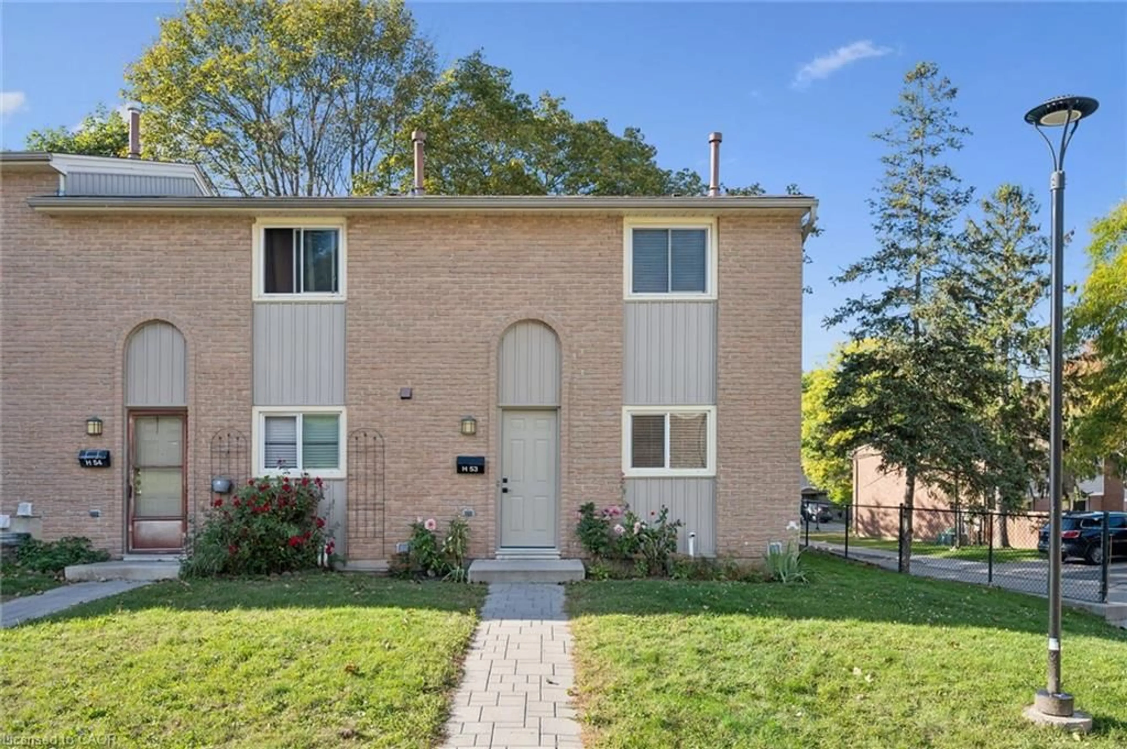 Home with brick exterior material, street for 223 Pioneer Dr #H53, Kitchener Ontario N2P 1L9