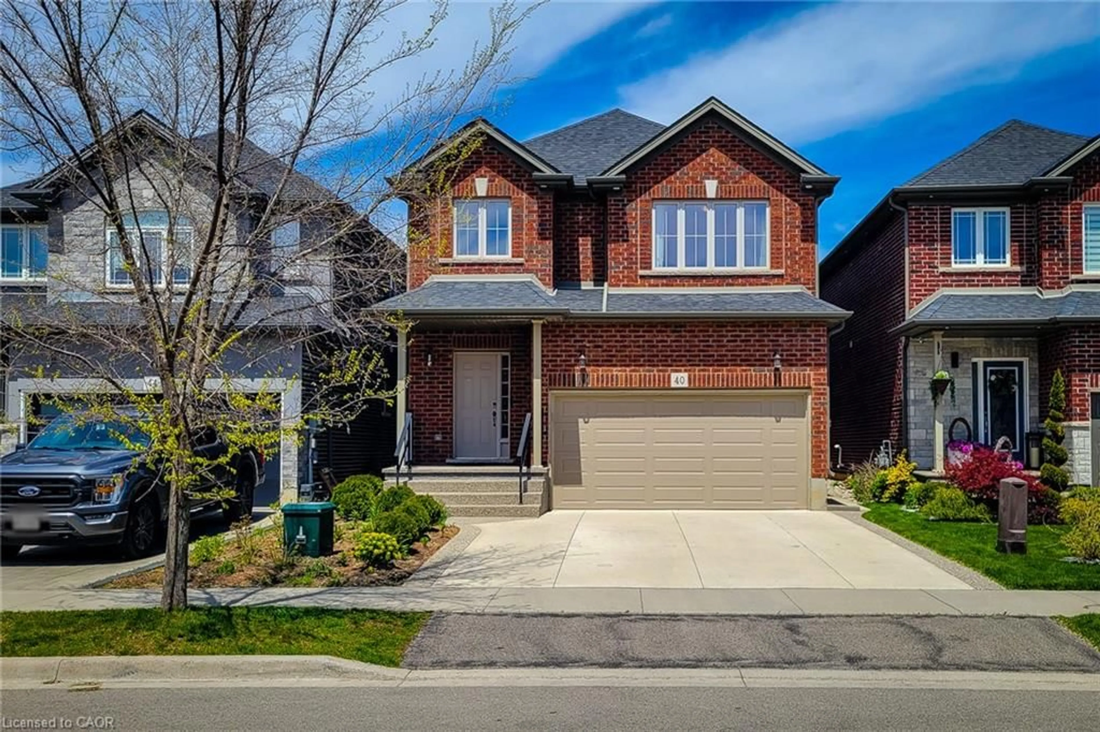 Home with brick exterior material, street for 40 Fairgrounds Dr, Binbrook Ontario L0R 1C0