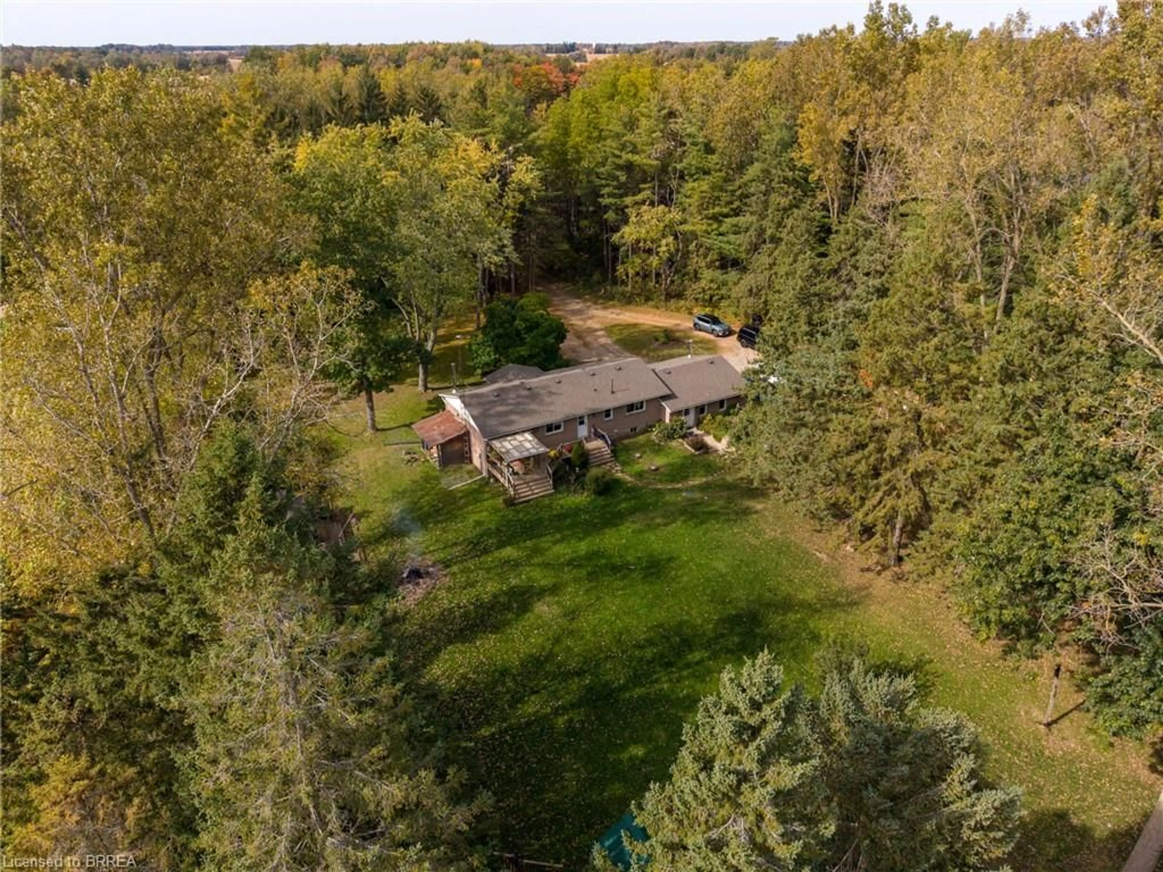 A pic from outside/outdoor area/front of a property/back of a property/a pic from drone, forest/trees view for 84 Etonia Rd, Princeton Ontario N0J 1V0