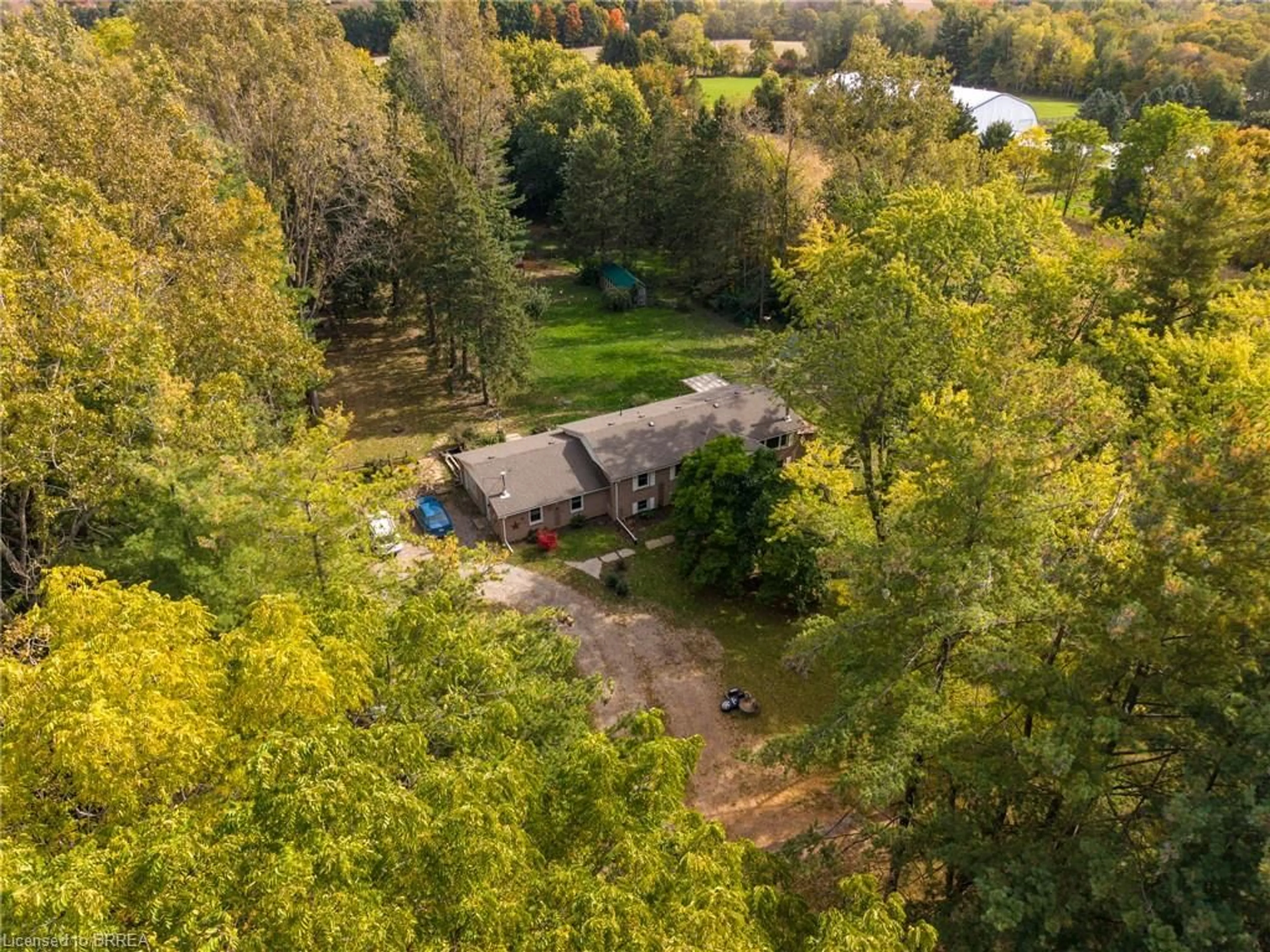A pic from outside/outdoor area/front of a property/back of a property/a pic from drone, forest/trees view for 84 Etonia Rd, Princeton Ontario N0J 1V0