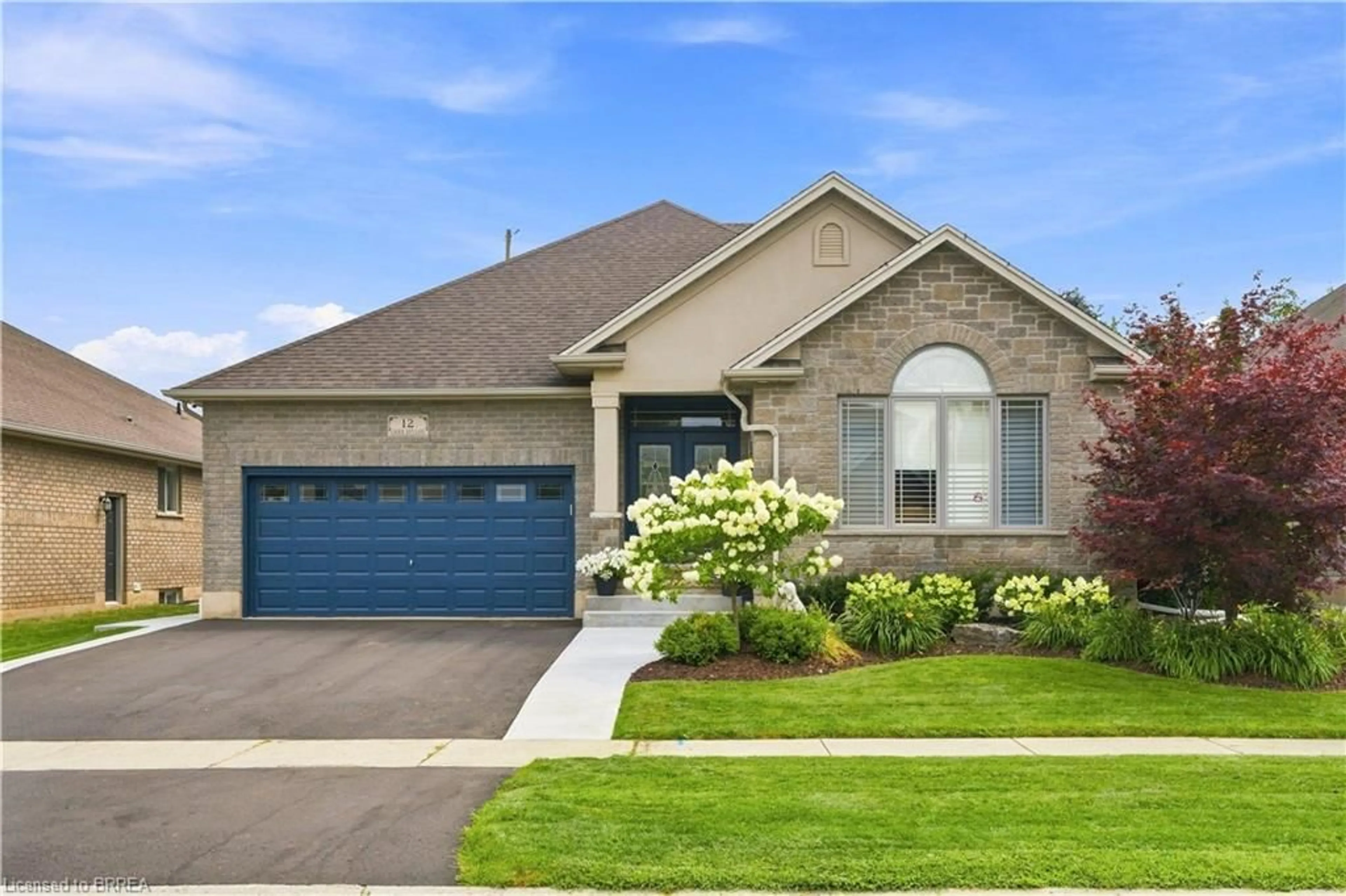 Home with brick exterior material, street for 12 Laurie Ann Lane, Paris Ontario N3L 4H4