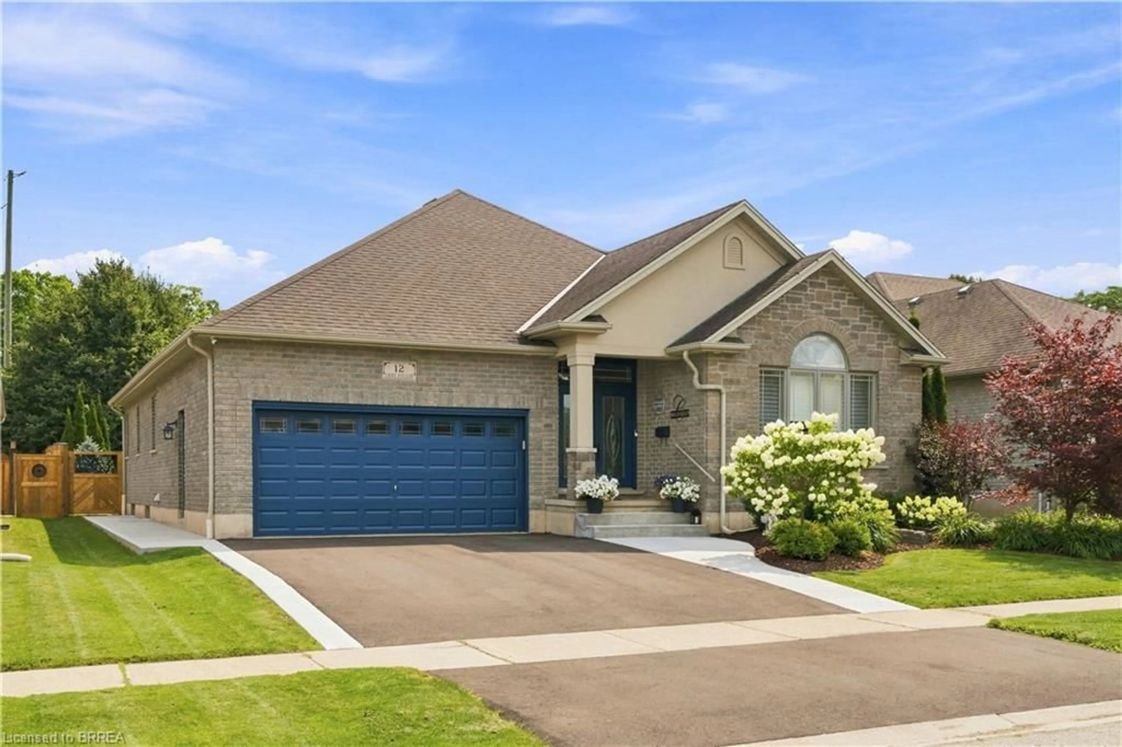 Home with brick exterior material, street for 12 Laurie Ann Lane, Paris Ontario N3L 4H4