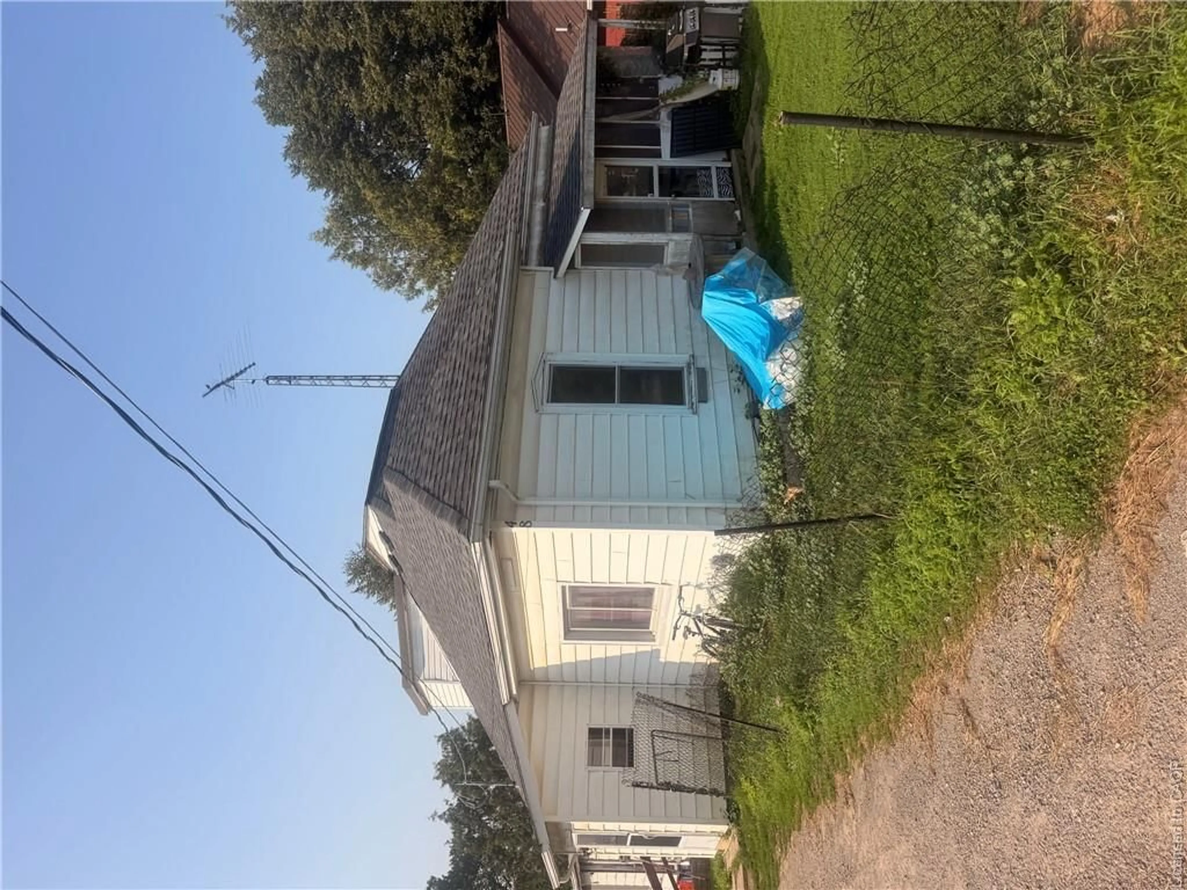 A pic from outside/outdoor area/front of a property/back of a property/a pic from drone, street for 48 Sovereen St, Delhi Ontario N4B 1L6