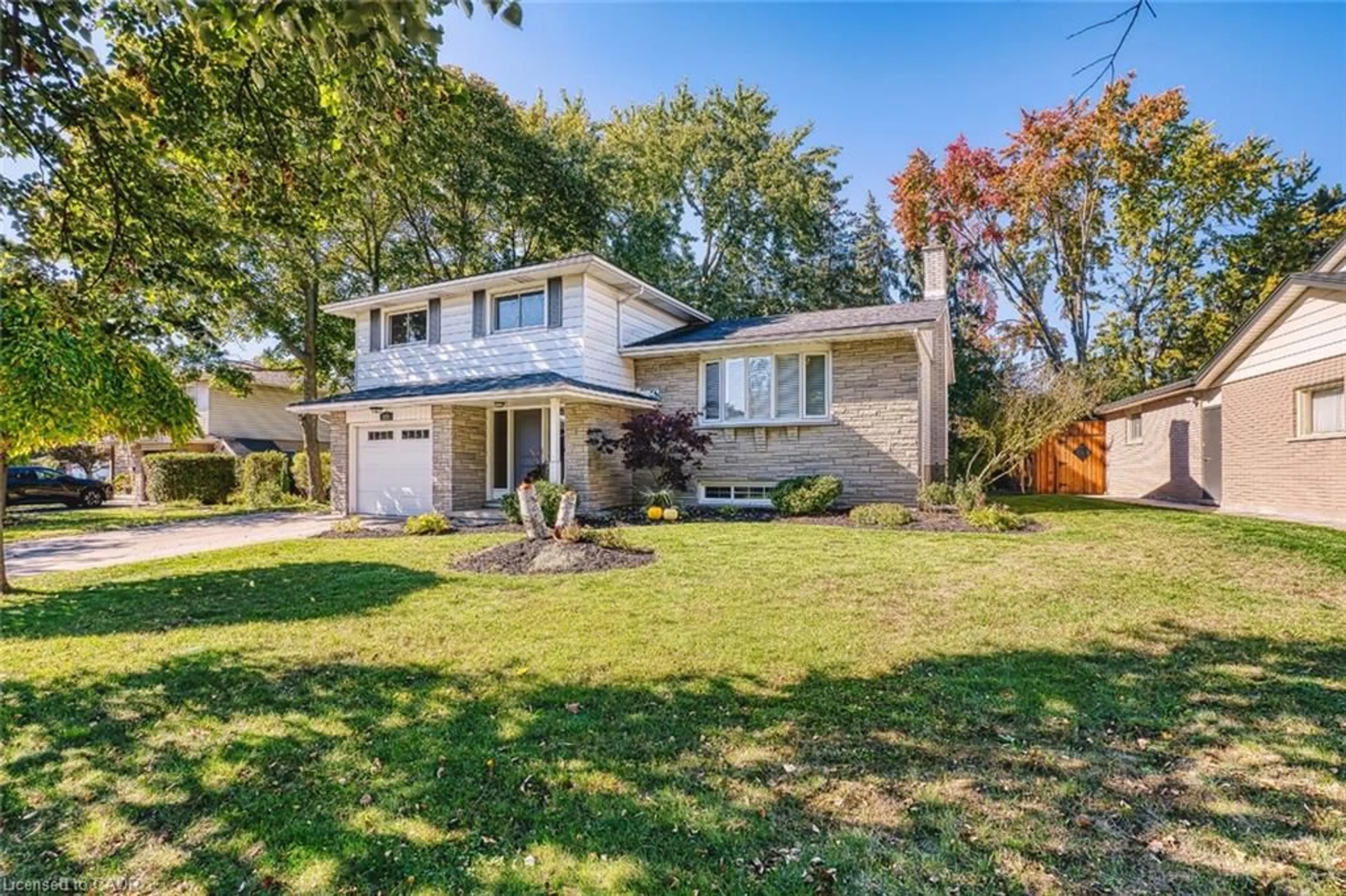 Home with vinyl exterior material, street for 127 Midland Dr, Kitchener Ontario N2A 2A9