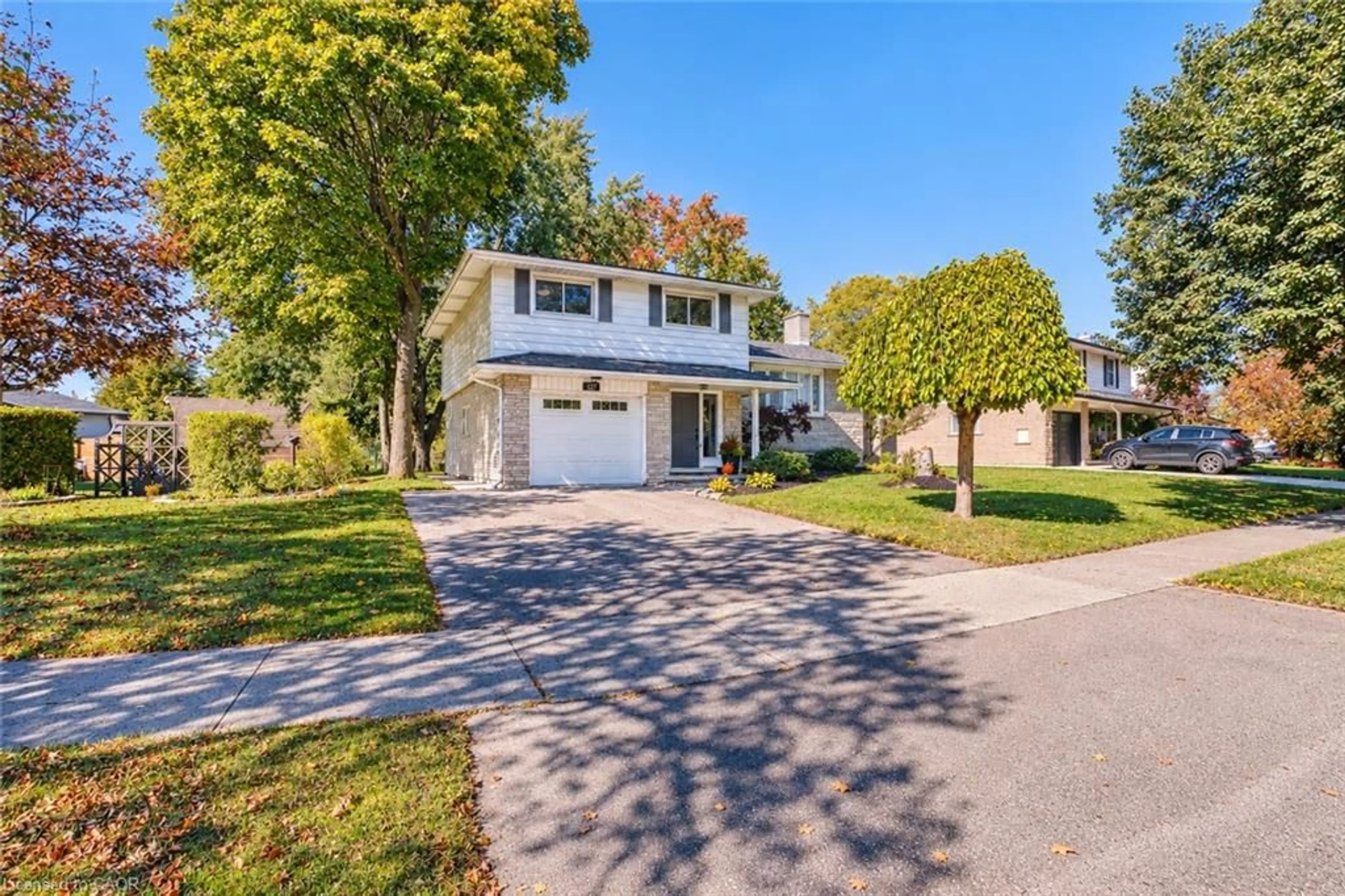 Home with vinyl exterior material, street for 127 Midland Dr, Kitchener Ontario N2A 2A9