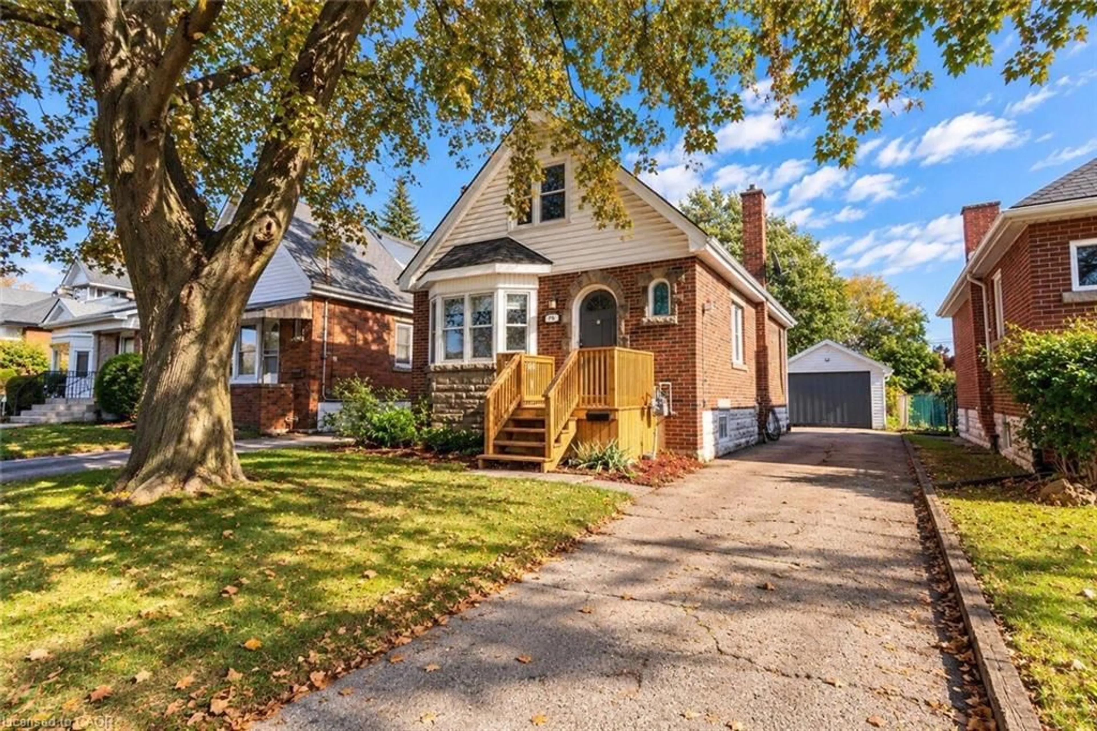 Home with brick exterior material, street for 75 Barons Ave, Hamilton Ontario L8K 2Y4