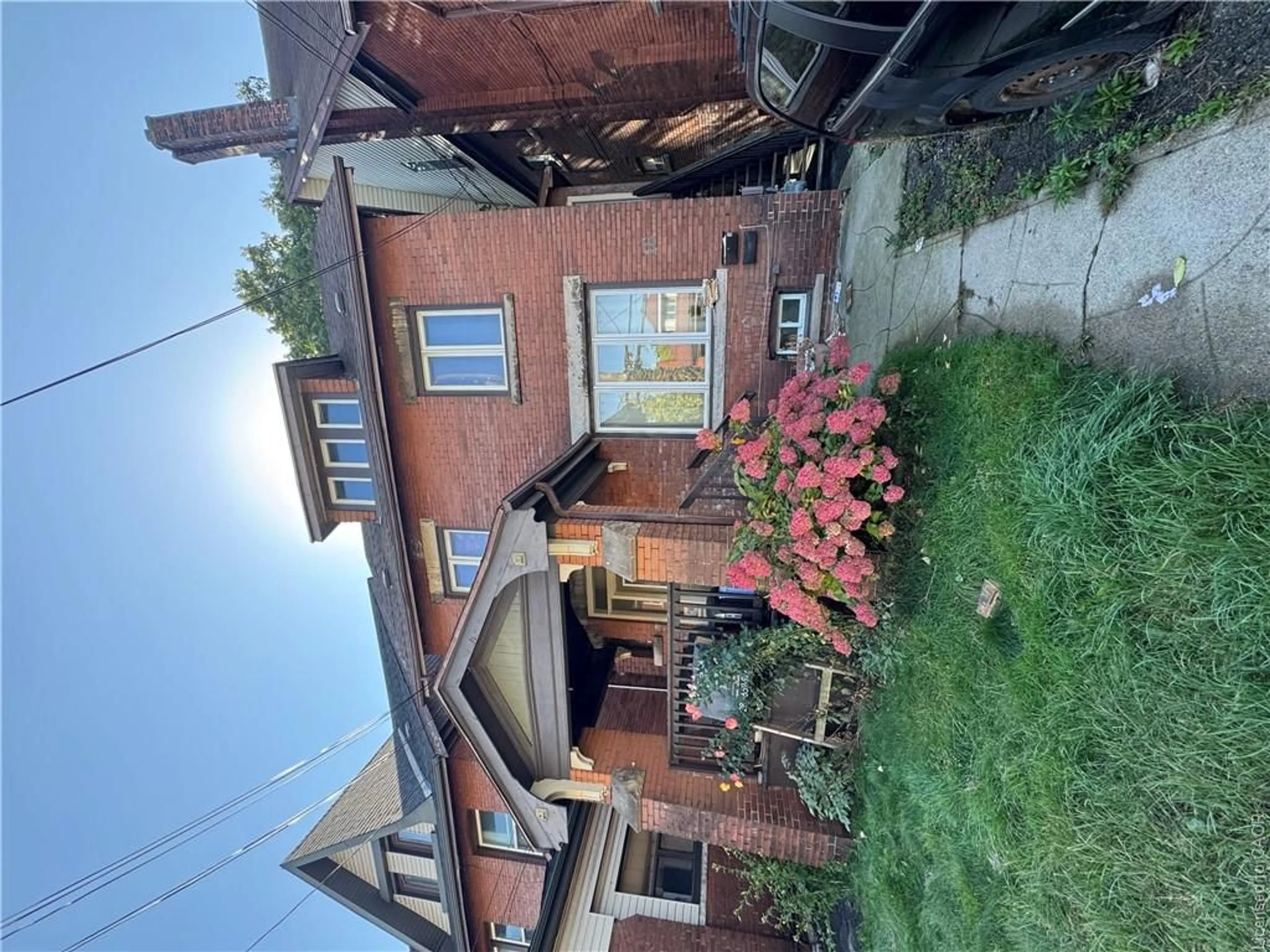 A pic from outside/outdoor area/front of a property/back of a property/a pic from drone, street for 16 Rutherford Ave, Hamilton Ontario L8M 1Y4