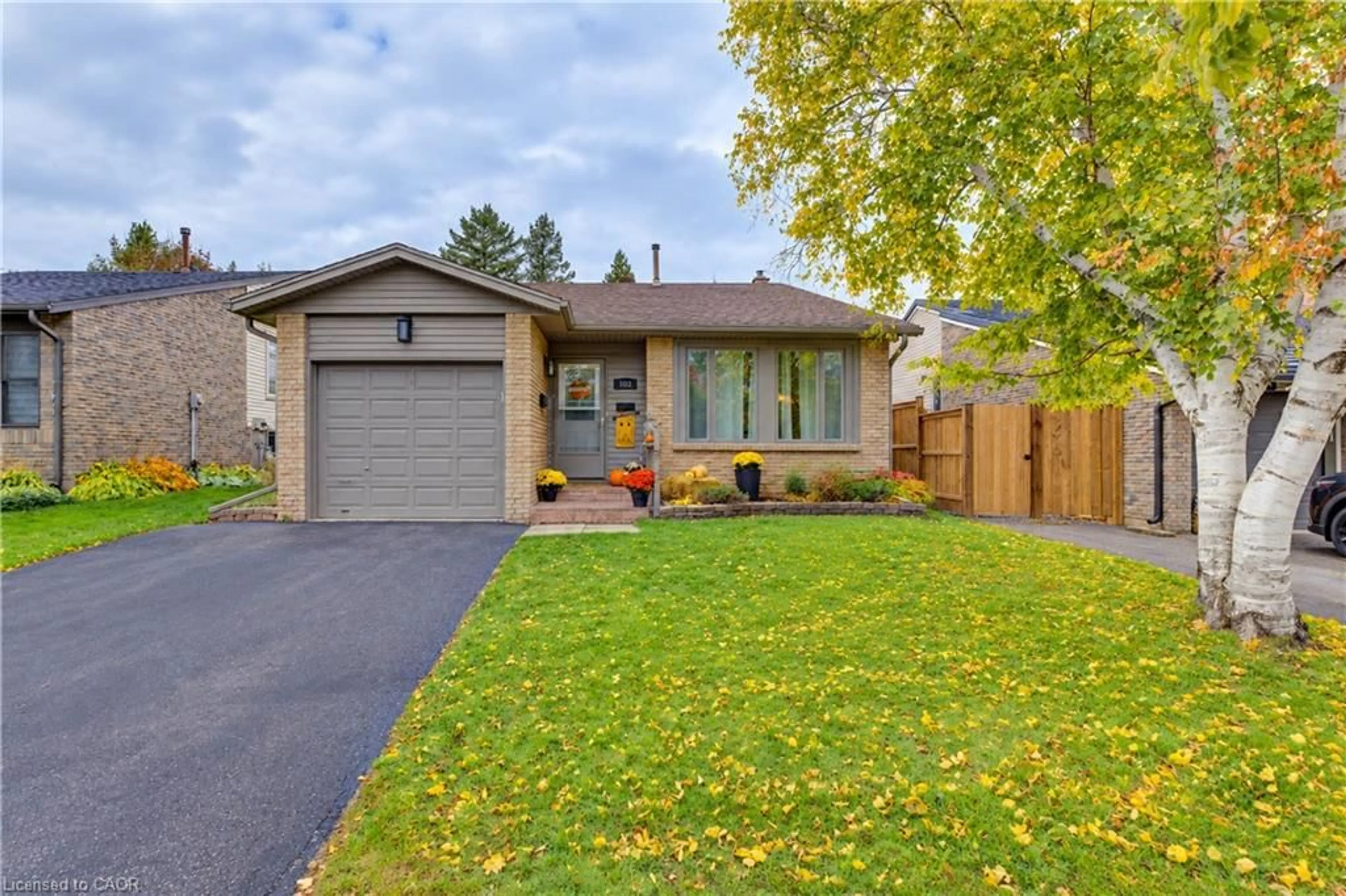 Home with brick exterior material, street for 102 Toynbee Cres, Kitchener Ontario N2N 1R9