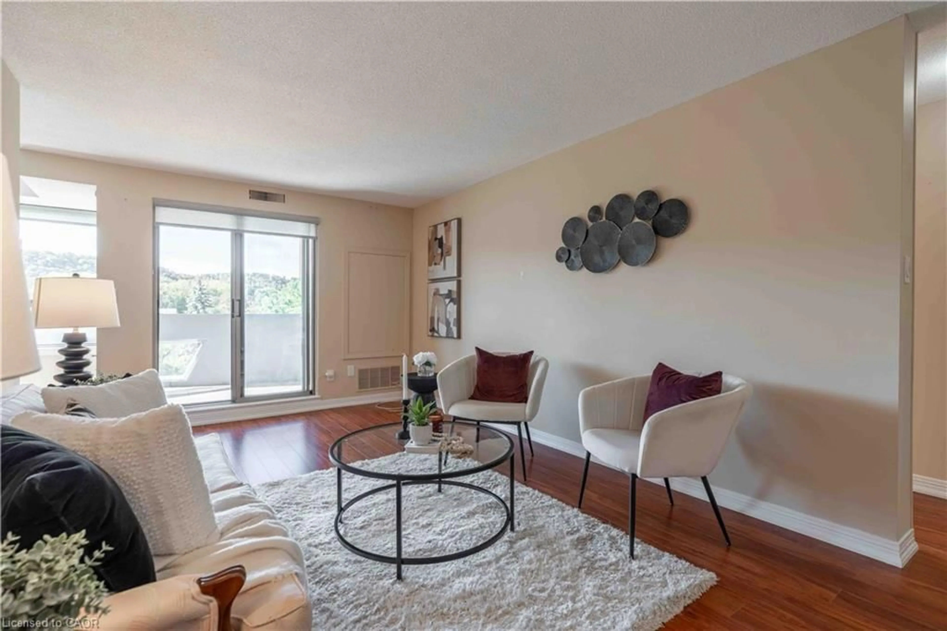 Living room with furniture, unknown for 606 Village Green Blvd #6, Stoney Creek Ontario L8G 5B7