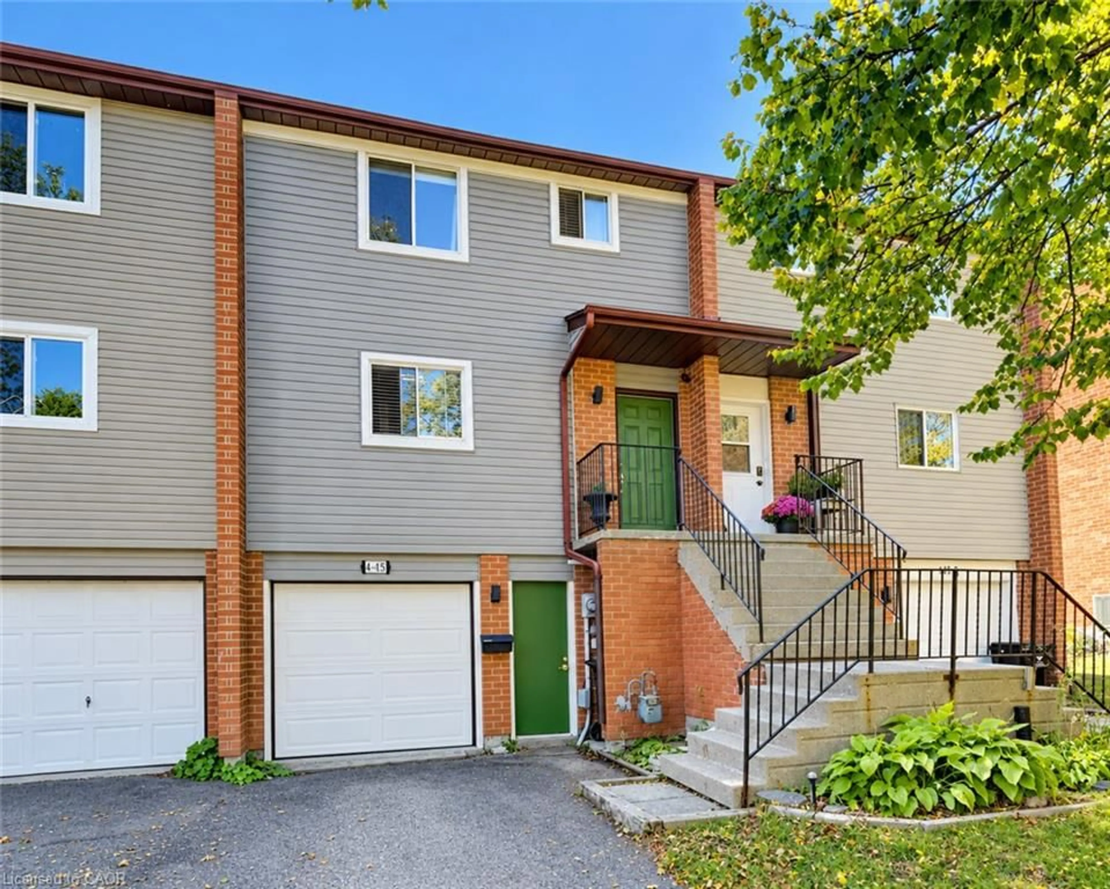 Home with vinyl exterior material, street for 415 Bairstow Cres #4, Waterloo Ontario N2K 2H7