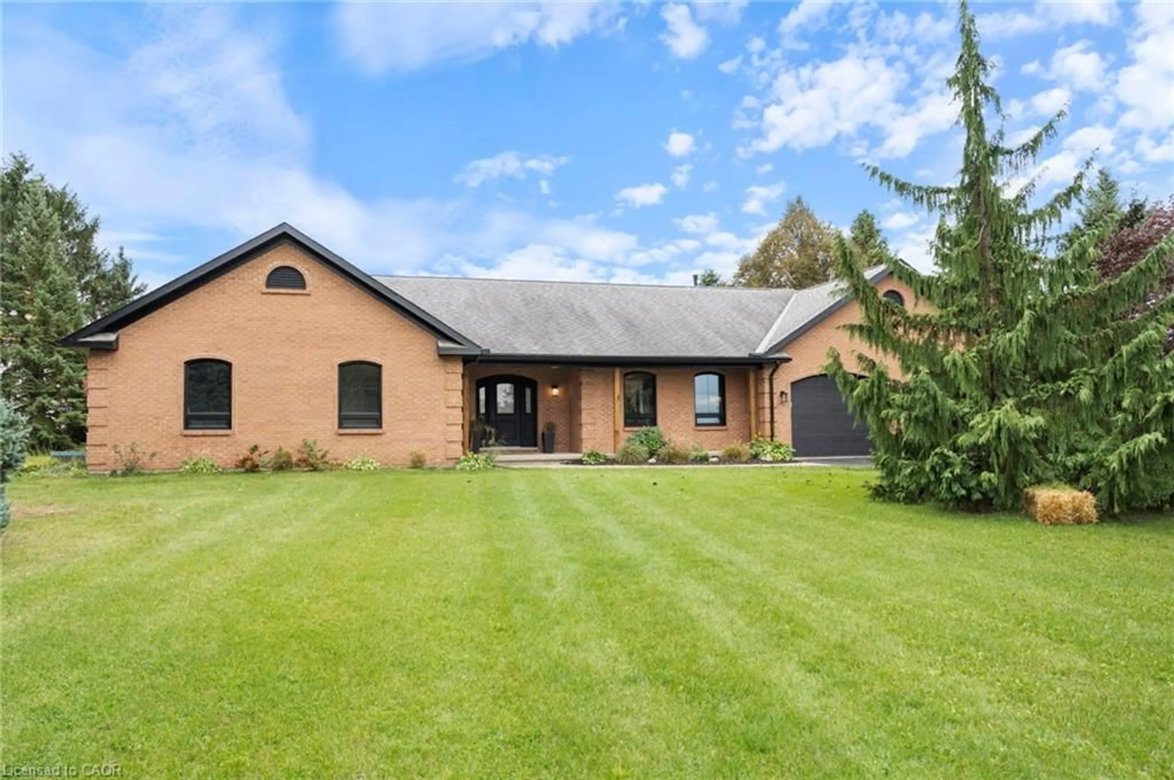 Home with brick exterior material, street for 320 Evergreen Hill Rd, Simcoe Ontario N3Y 4K1