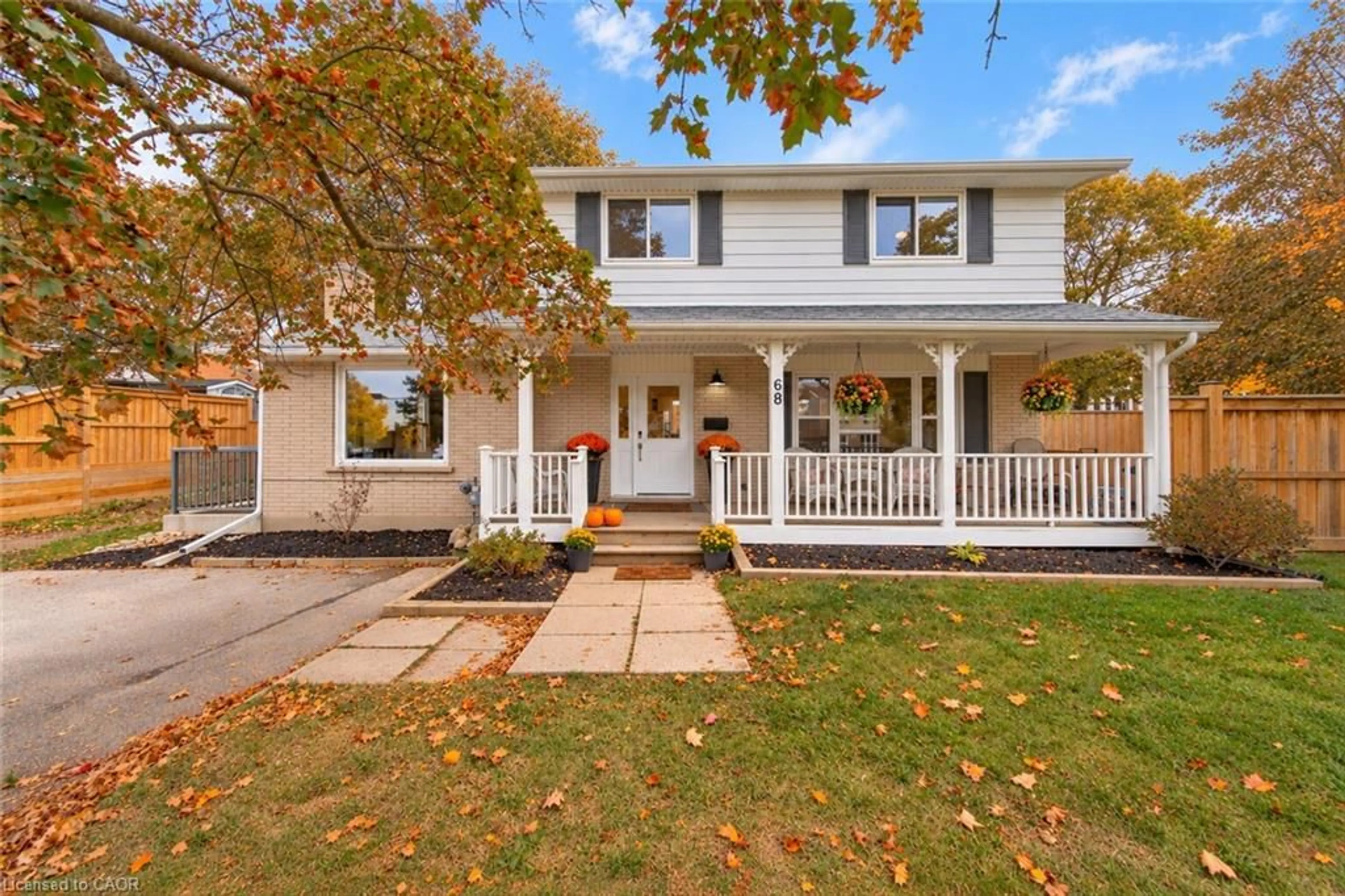Home with vinyl exterior material, street for 68 Hadati Rd, Guelph Ontario N1E 6H1