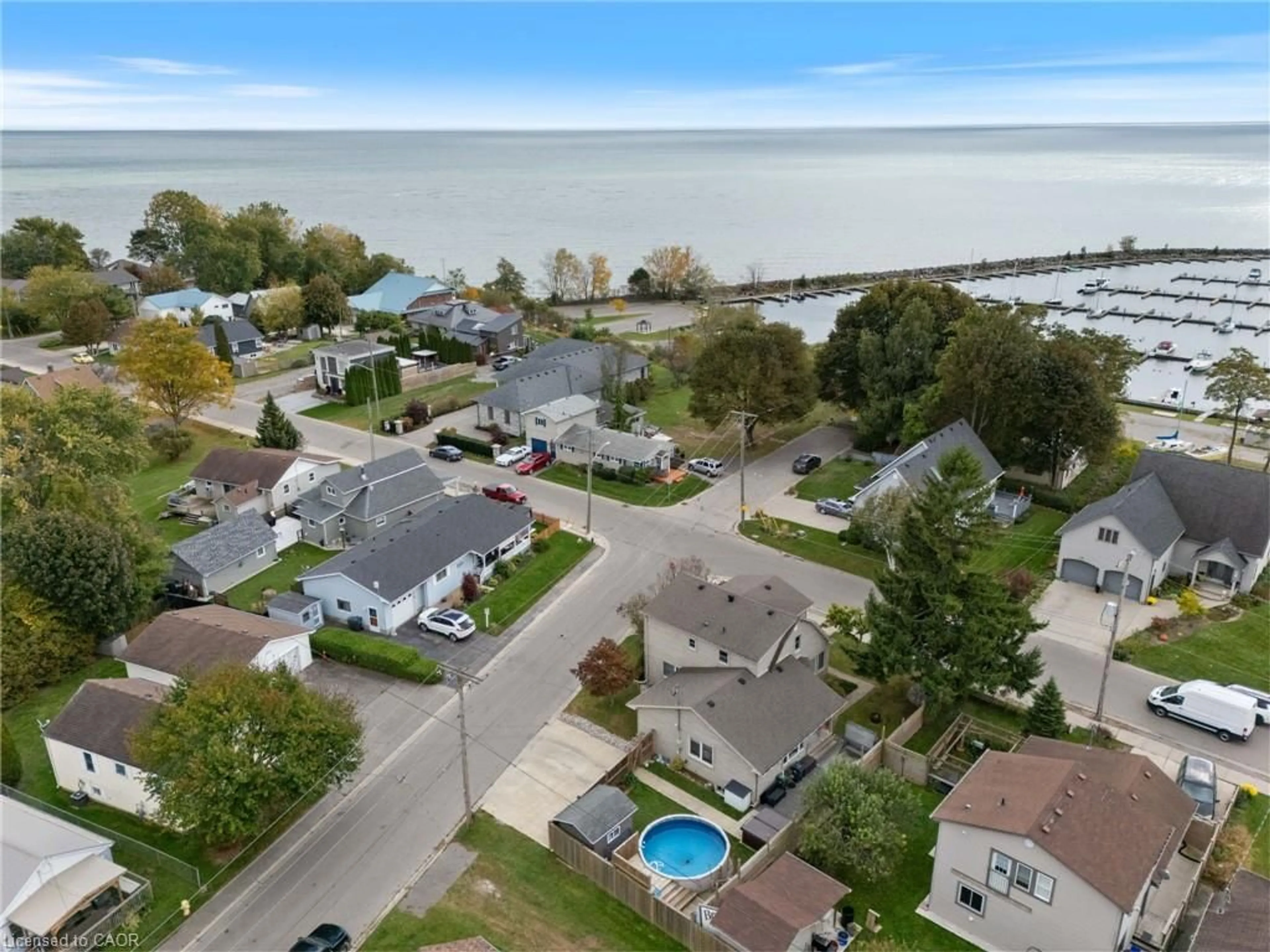 A pic from outside/outdoor area/front of a property/back of a property/a pic from drone, water/lake/river/ocean view for 61 Brown St, Port Dover Ontario N0A 1N7