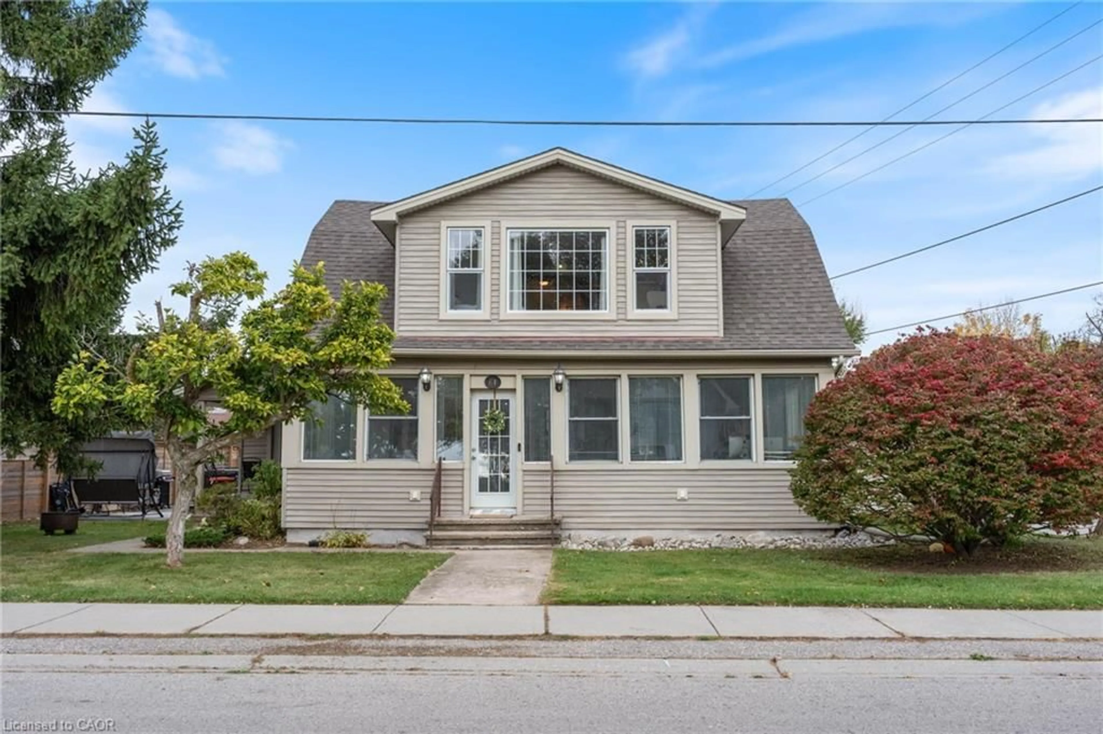 Home with vinyl exterior material, street for 61 Brown St, Port Dover Ontario N0A 1N7