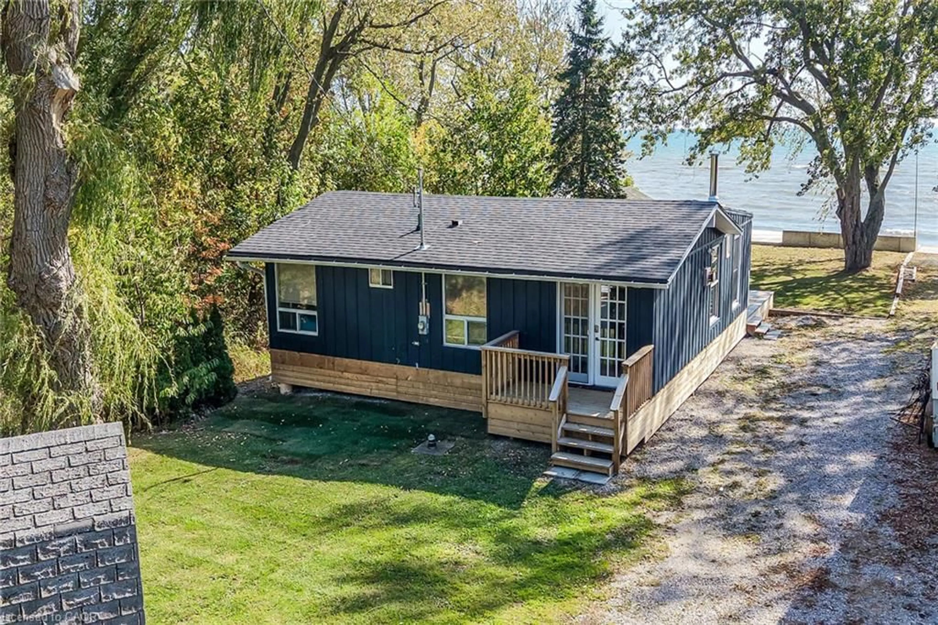 A pic from outside/outdoor area/front of a property/back of a property/a pic from drone, water/lake/river/ocean view for 1778 Lakeshore Rd, Haldimand Ontario N0A 1P0