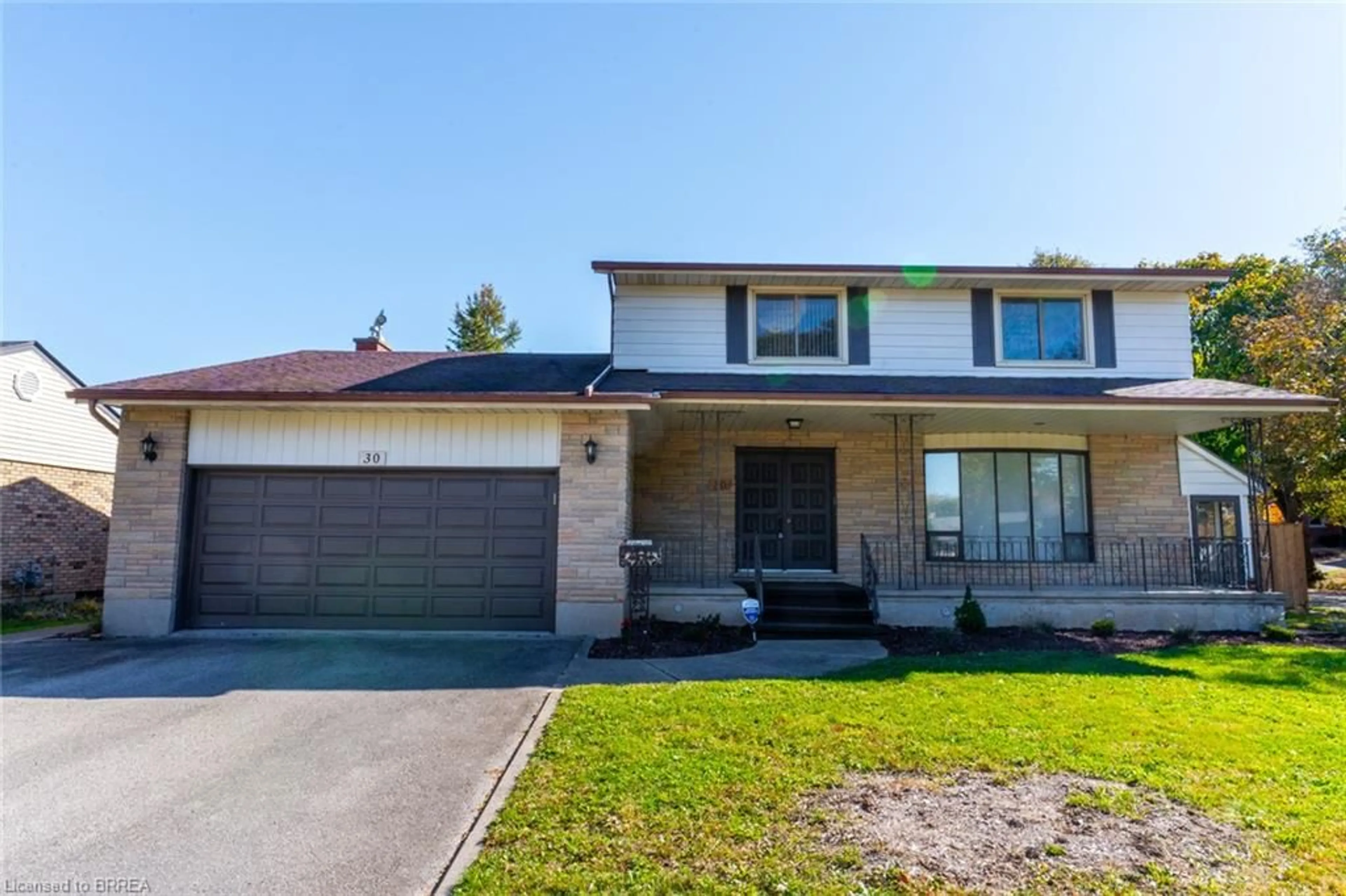 Home with brick exterior material, street for 30 Woodway Trail, Brantford Ontario N3R 6G7