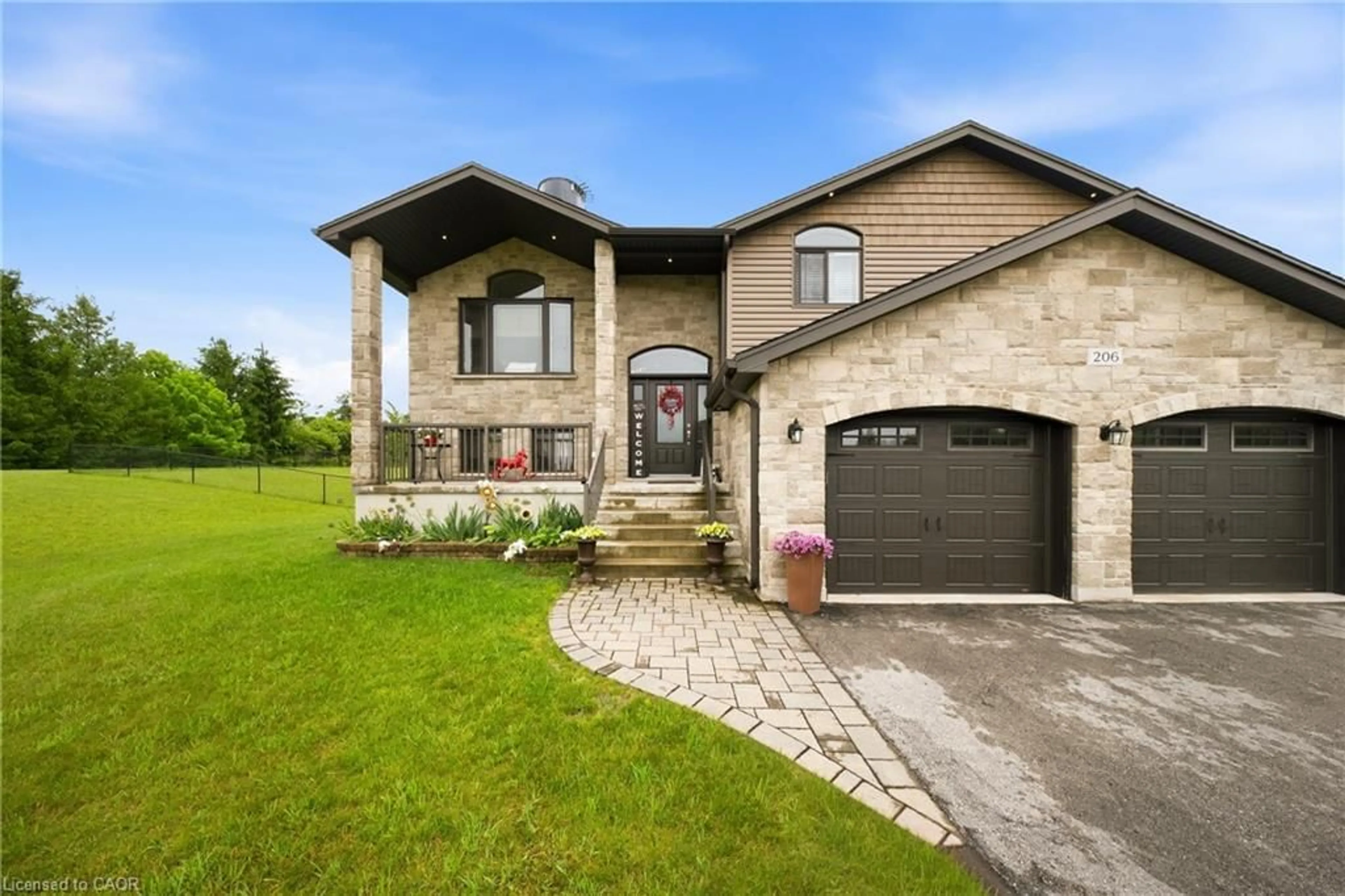 Home with brick exterior material, street for 206 Meredith Way, Grey Ontario N0H 1G0