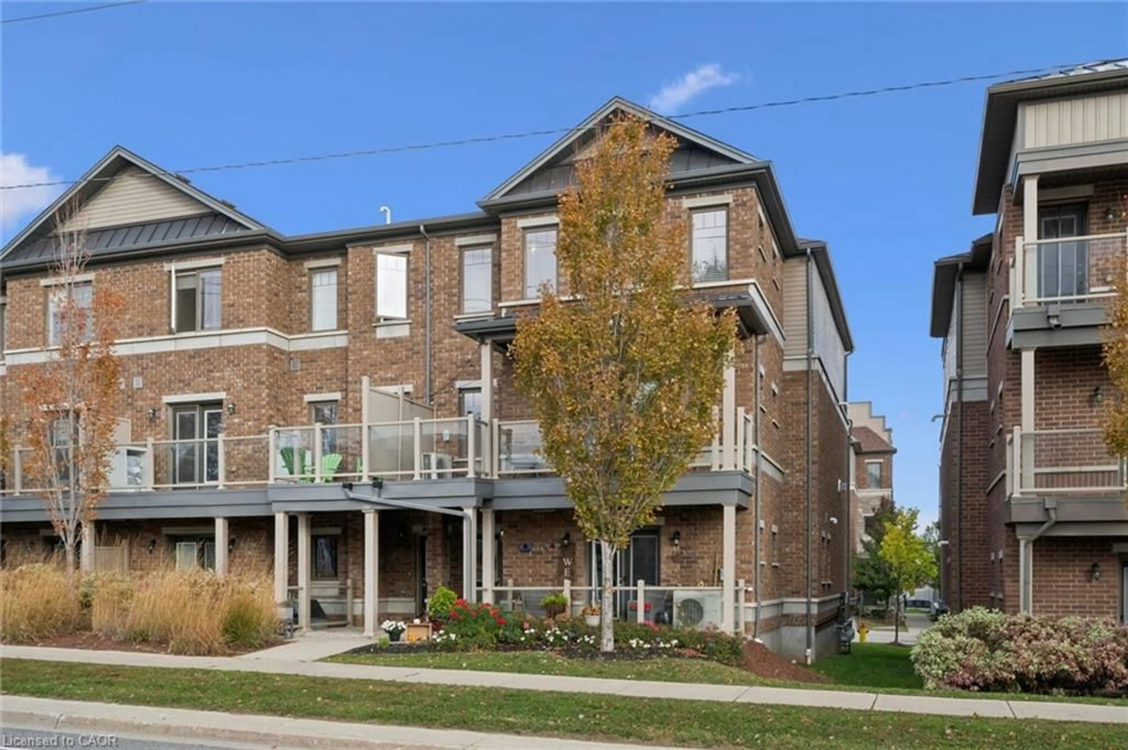 Home with brick exterior material, street for 1114 Fairway Rd #B, Kitchener Ontario N2A 0H6