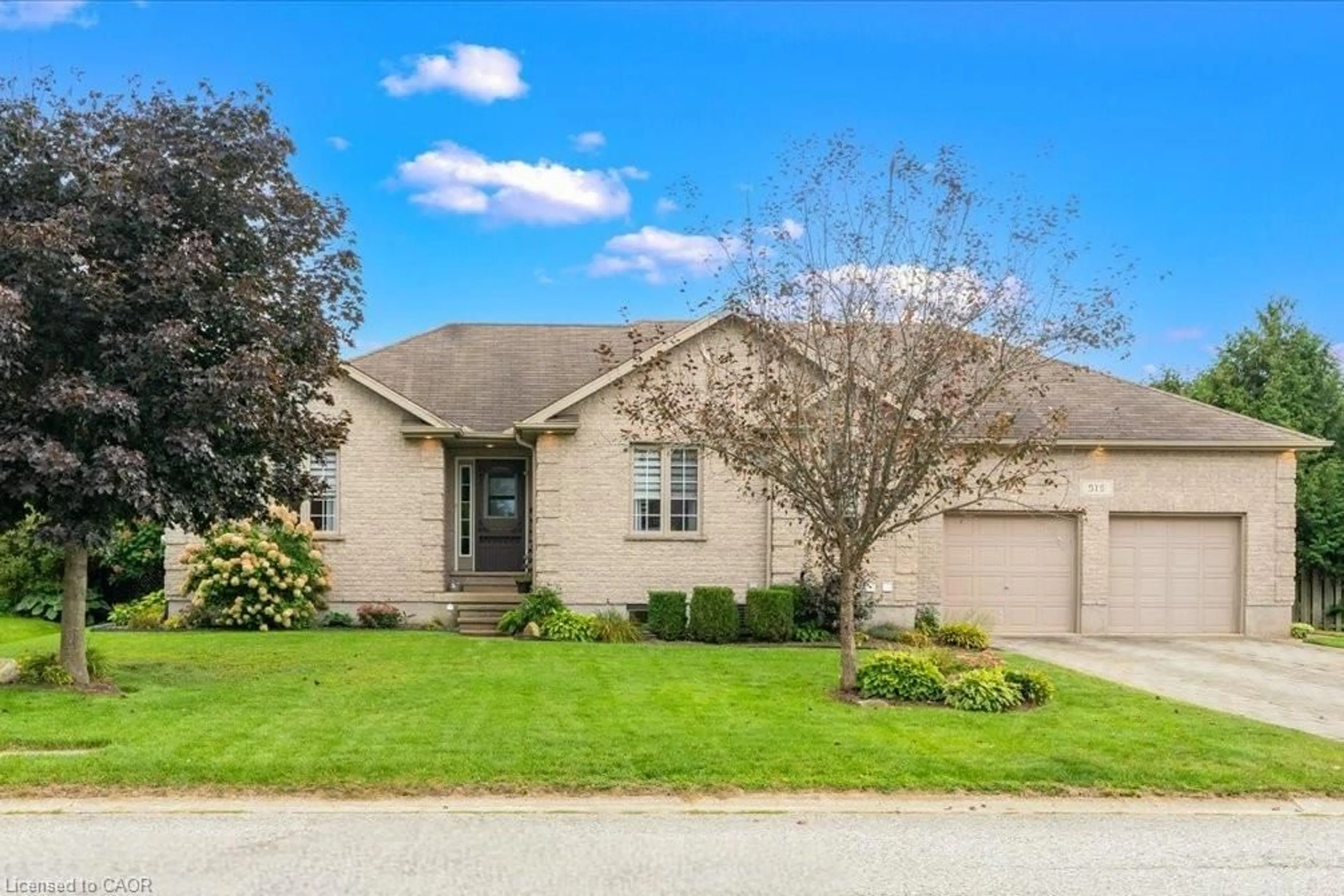 Home with brick exterior material, street for 515 Woodward Dr, Mount Brydges Ontario N0L 1W0